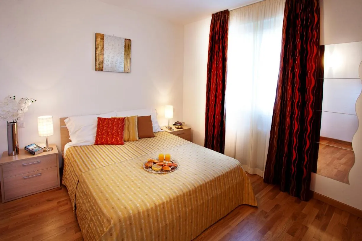 Bedroom, Bed in Tremezzo Residence 3-1 of 11 apartments in an exclusive residence by Italian Apartments