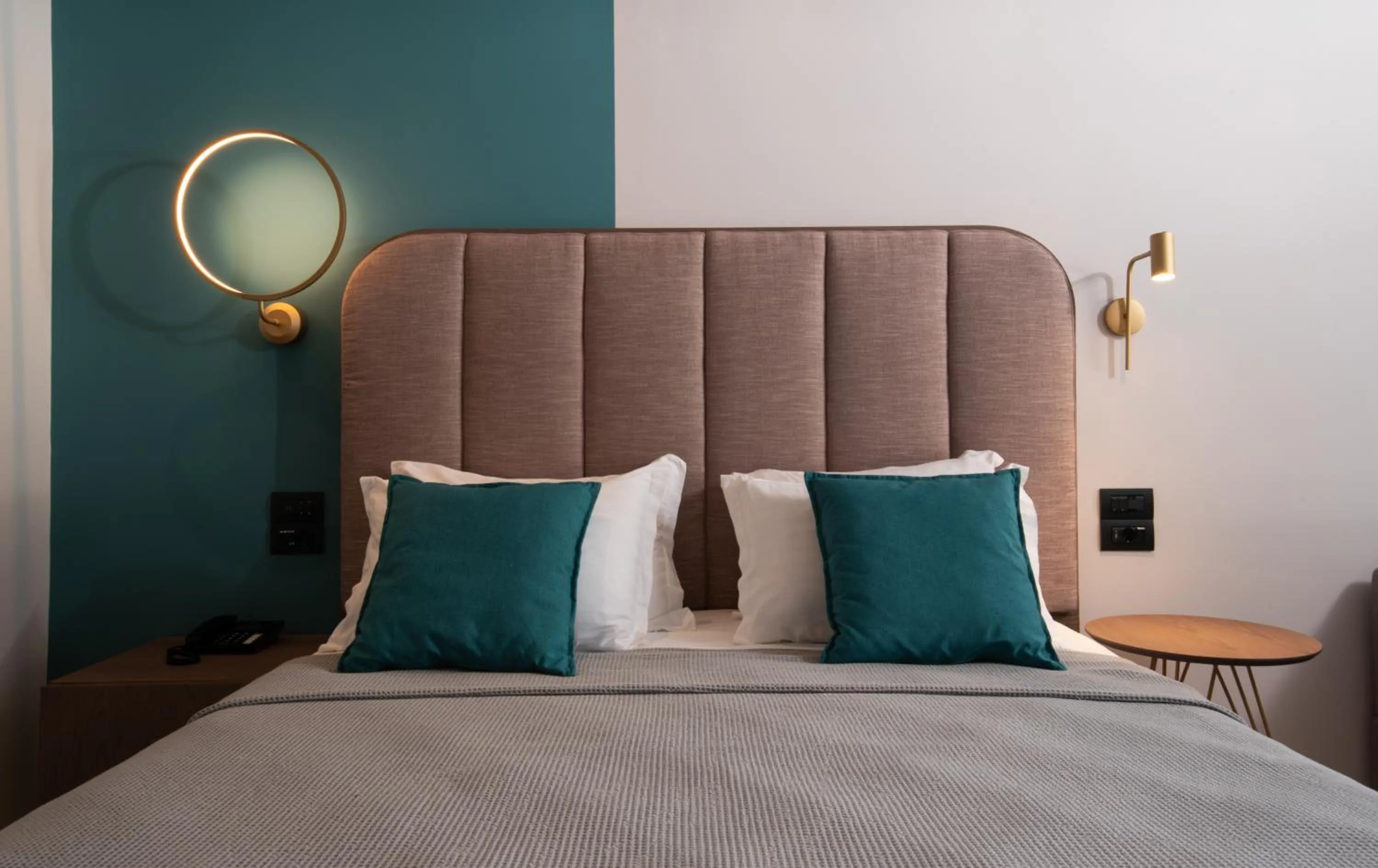 Bed in Lagomandra Luxury Suites with Private Pools