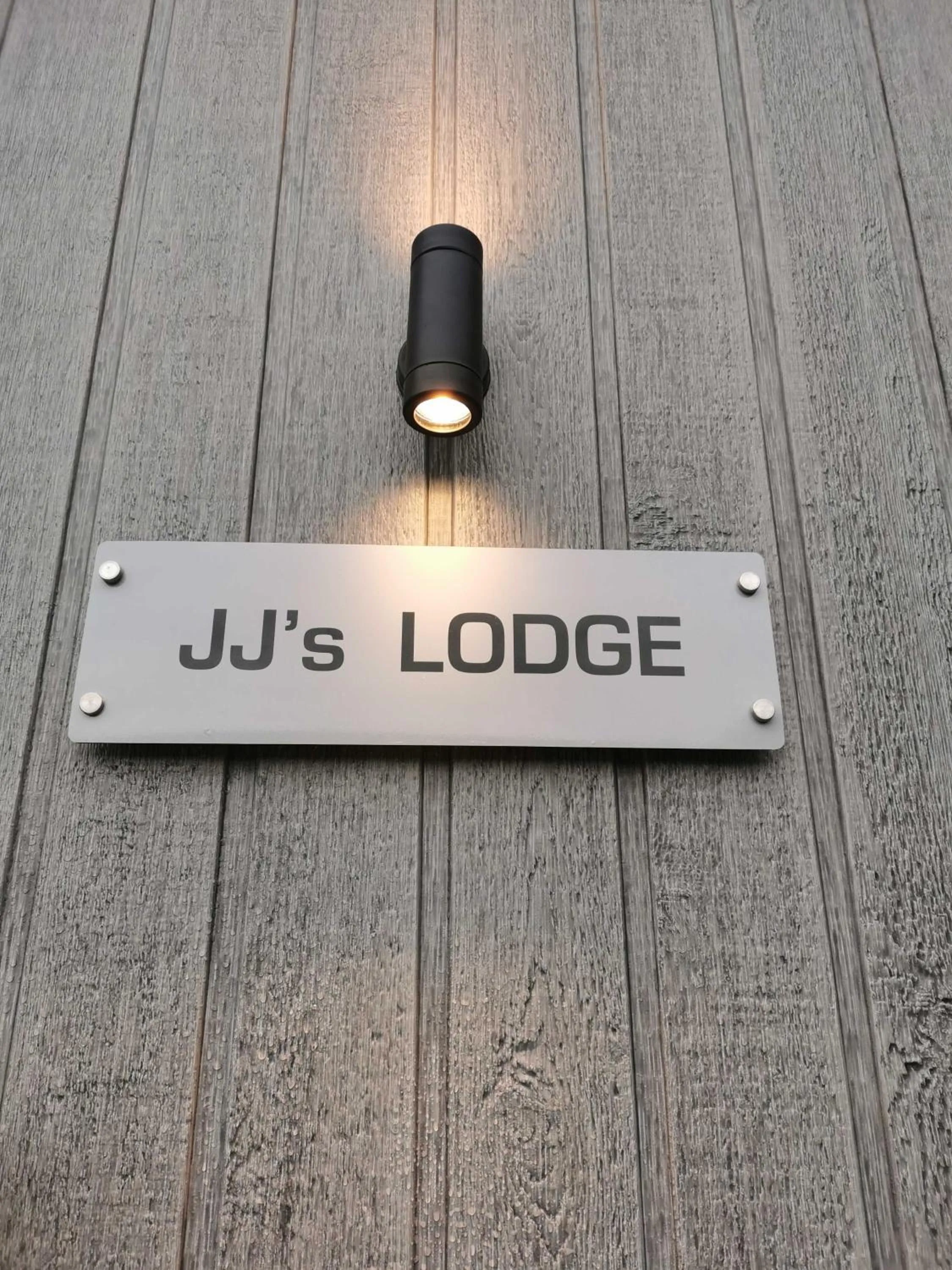 Property logo or sign in JJs Lodge Lakewood