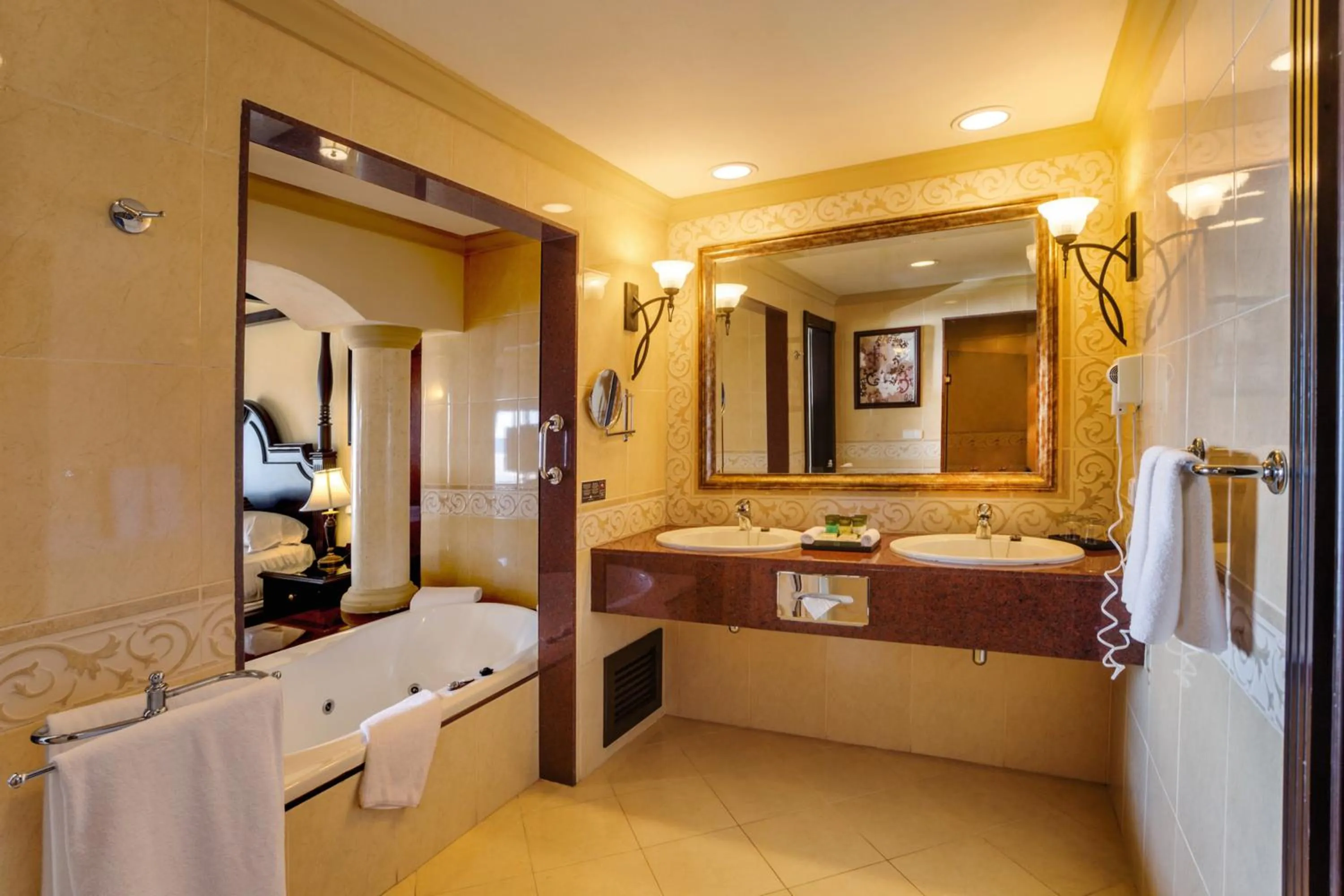 Bathroom, Bed in Riu Emerald Bay - All Inclusive