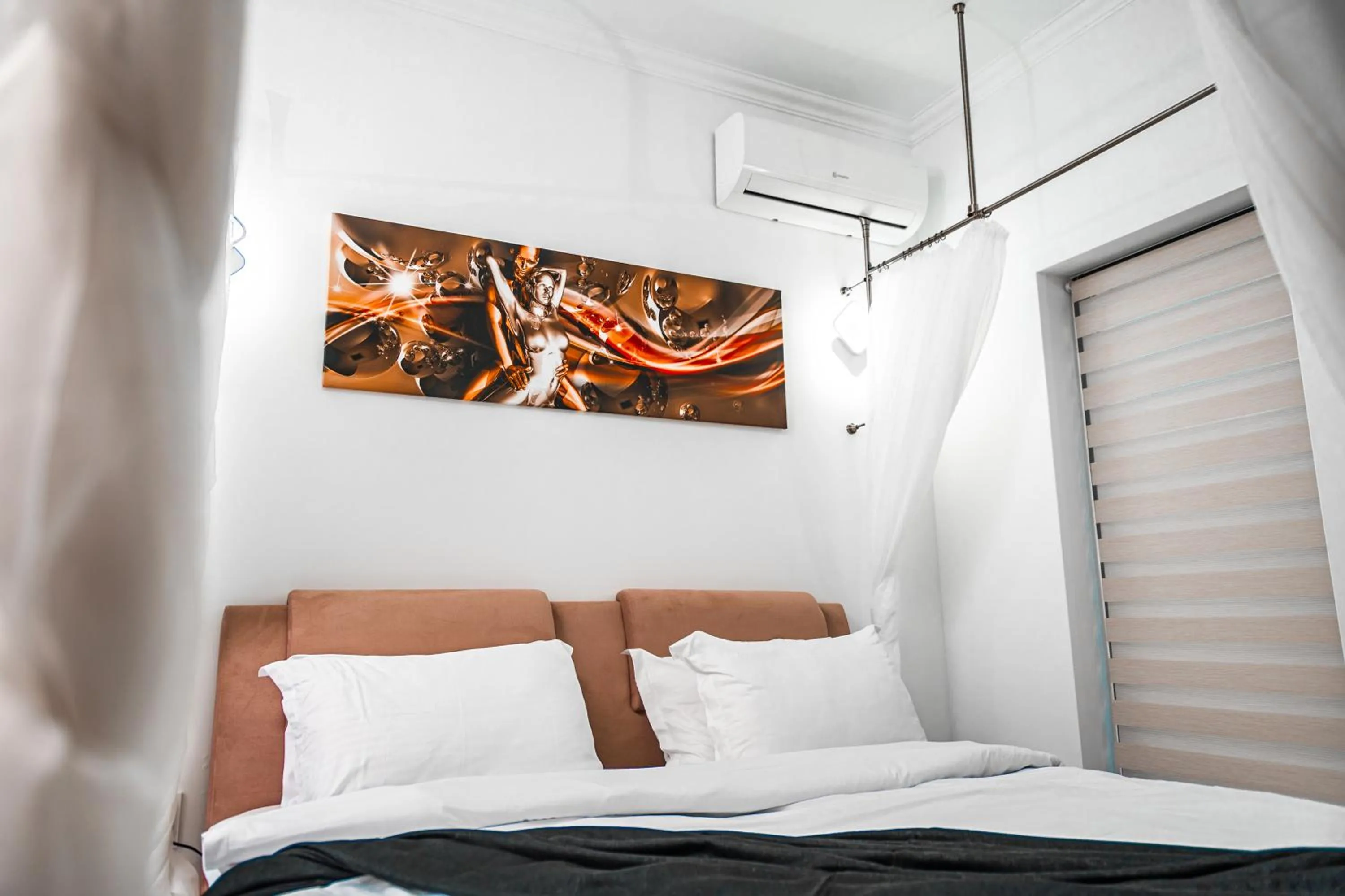 Bed in Puzzle Apartaments&Studios