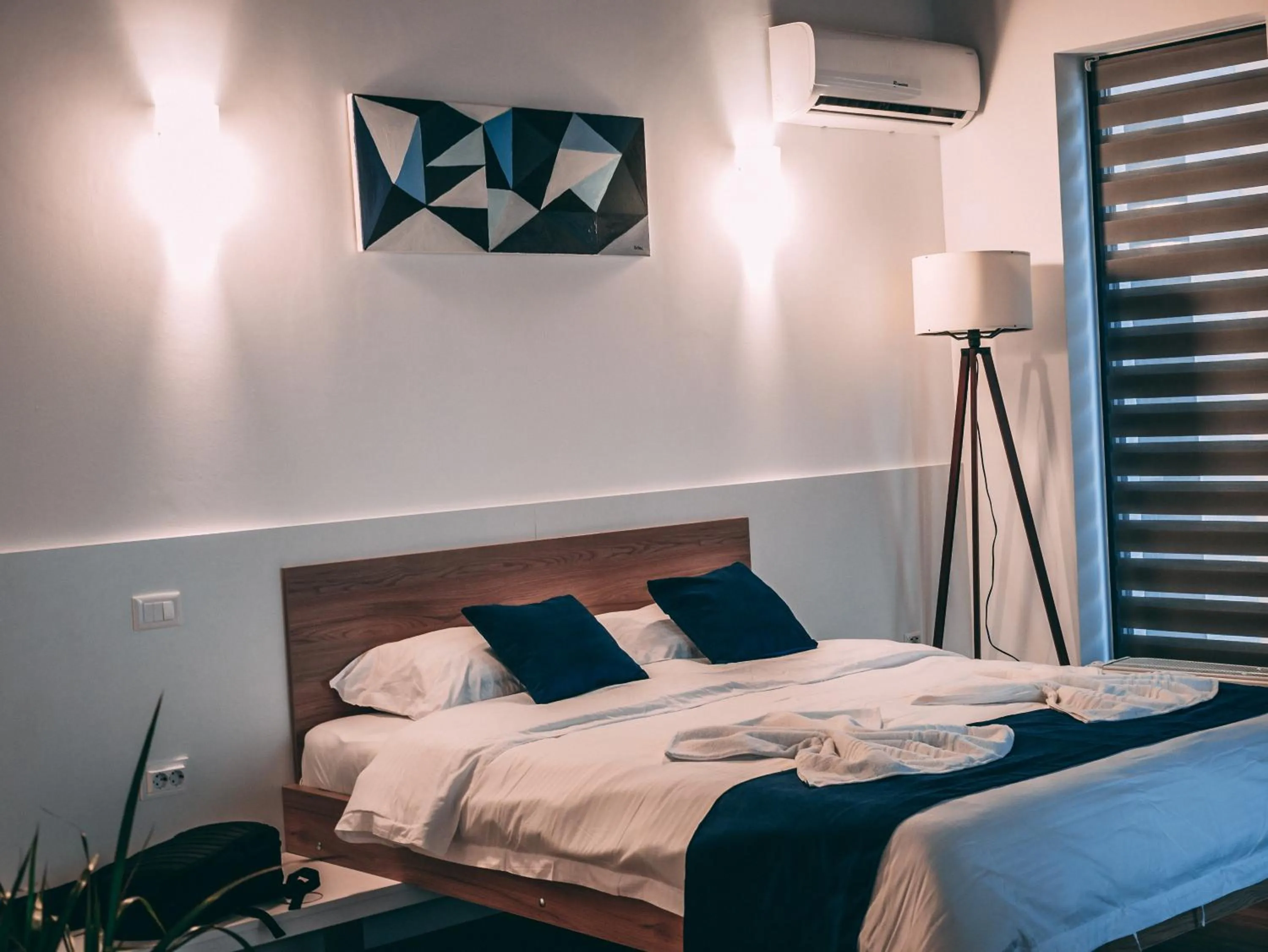 Bed in Puzzle Apartaments&Studios