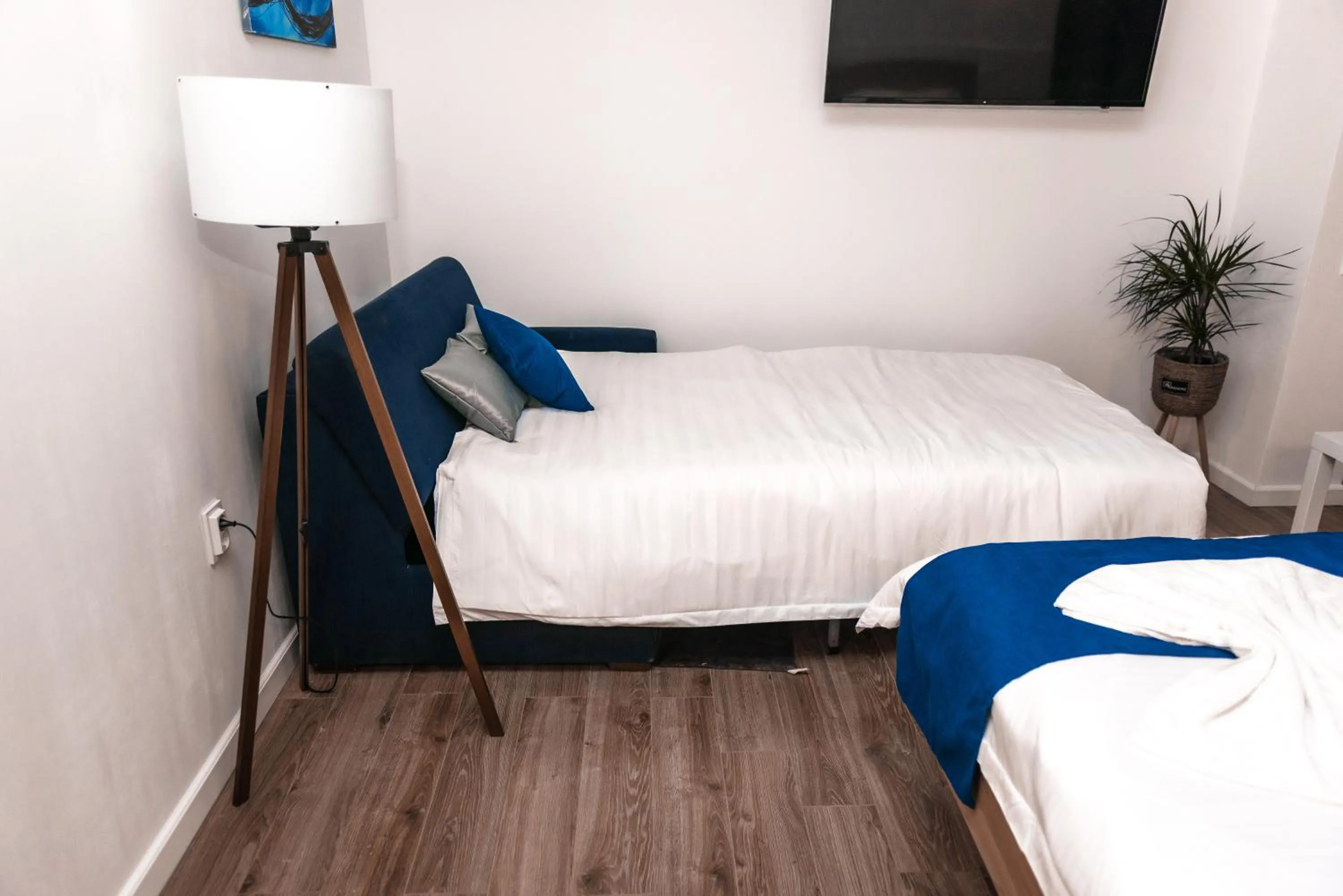 Bed in Puzzle Apartaments&Studios