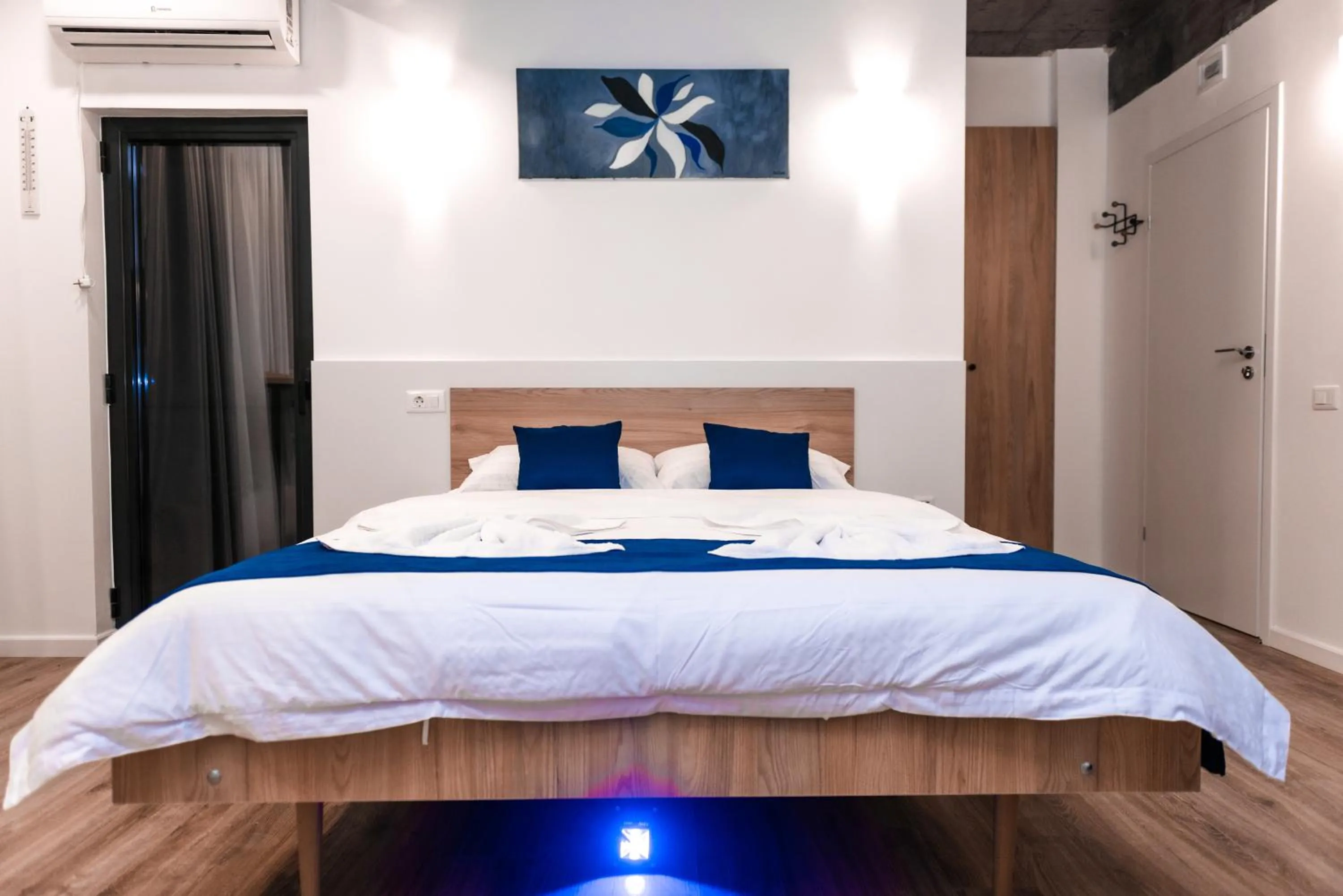 Bed in Puzzle Apartaments&Studios