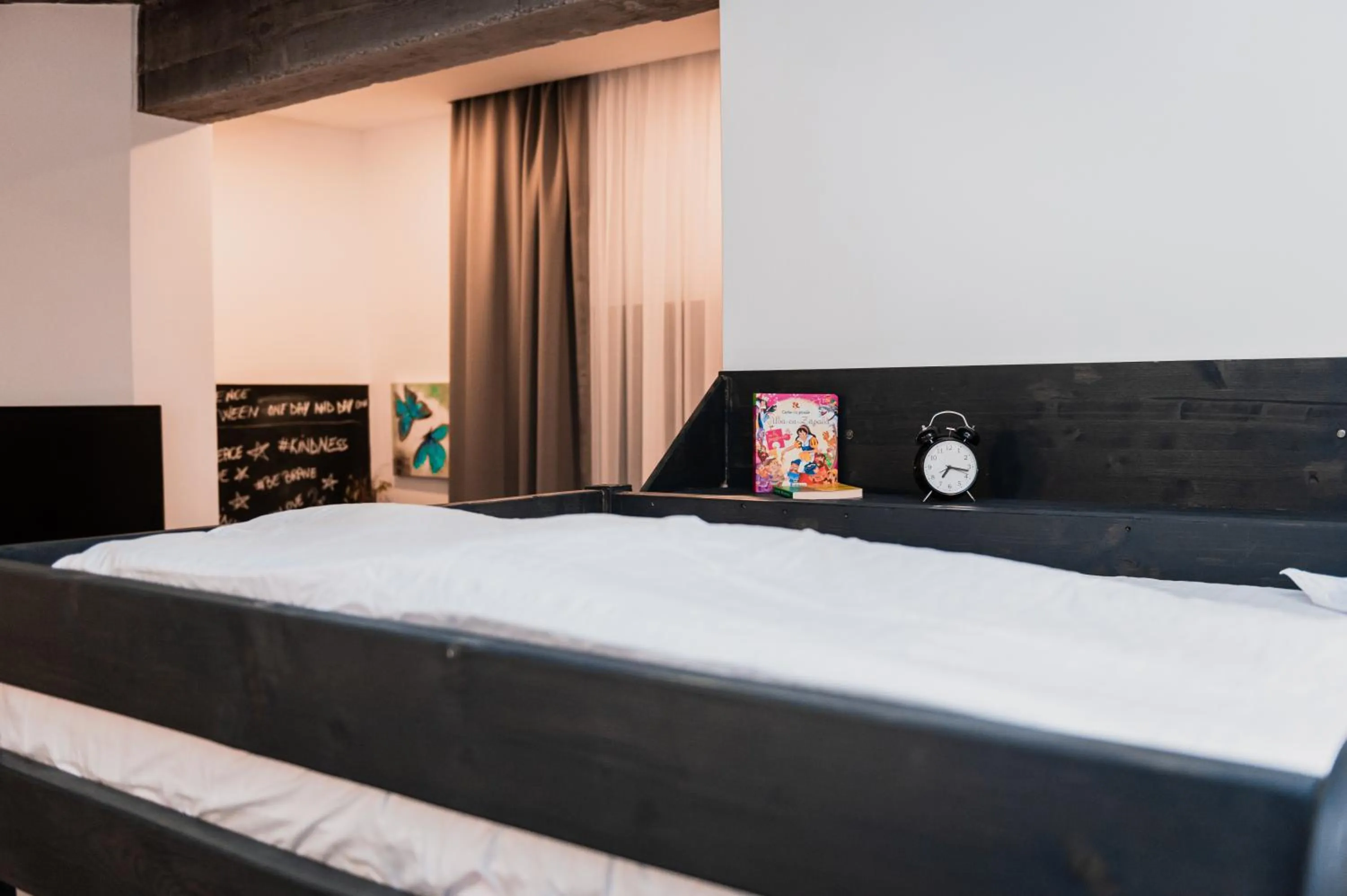 Bed in Puzzle Apartaments&Studios