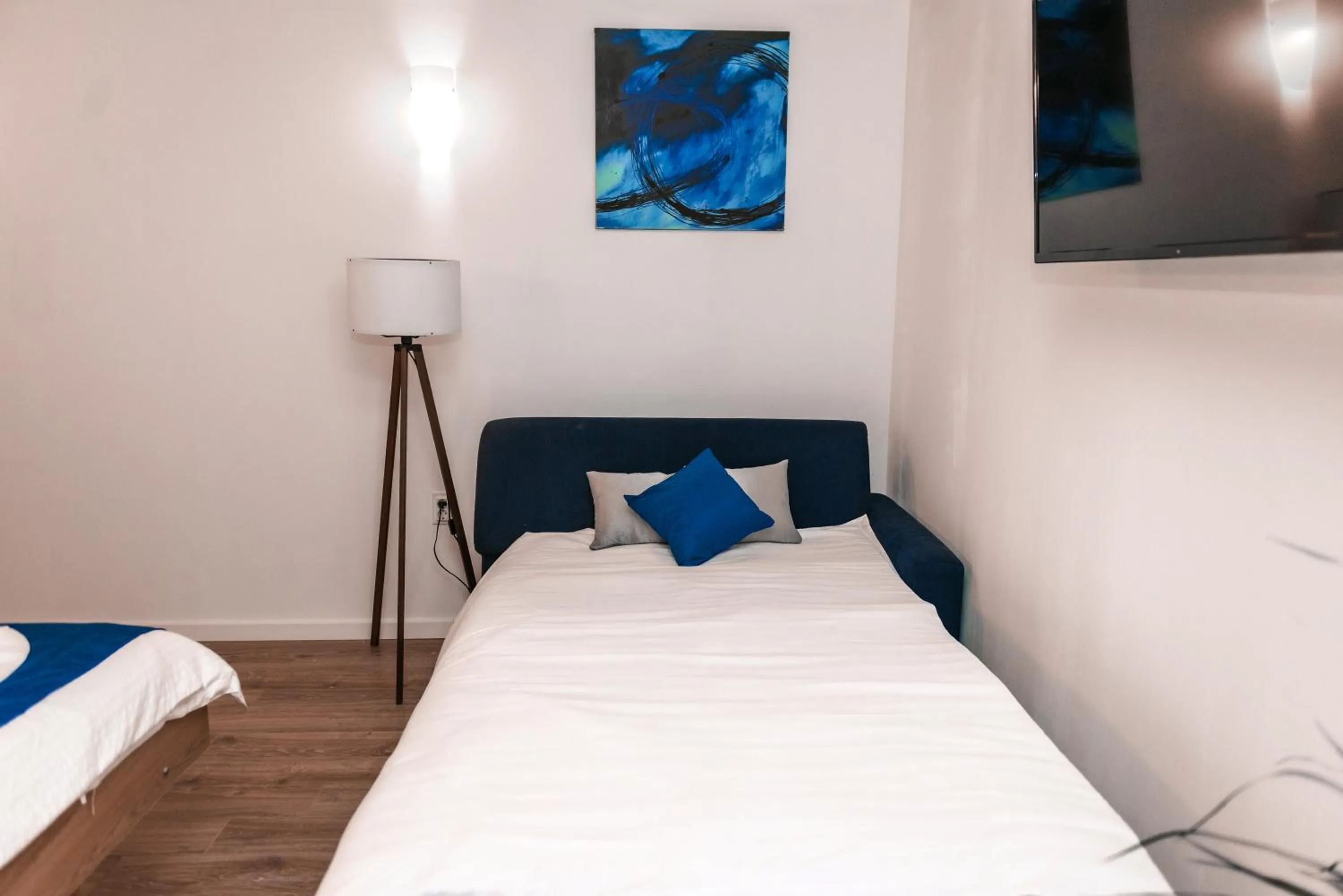 Bed in Puzzle Apartaments&Studios