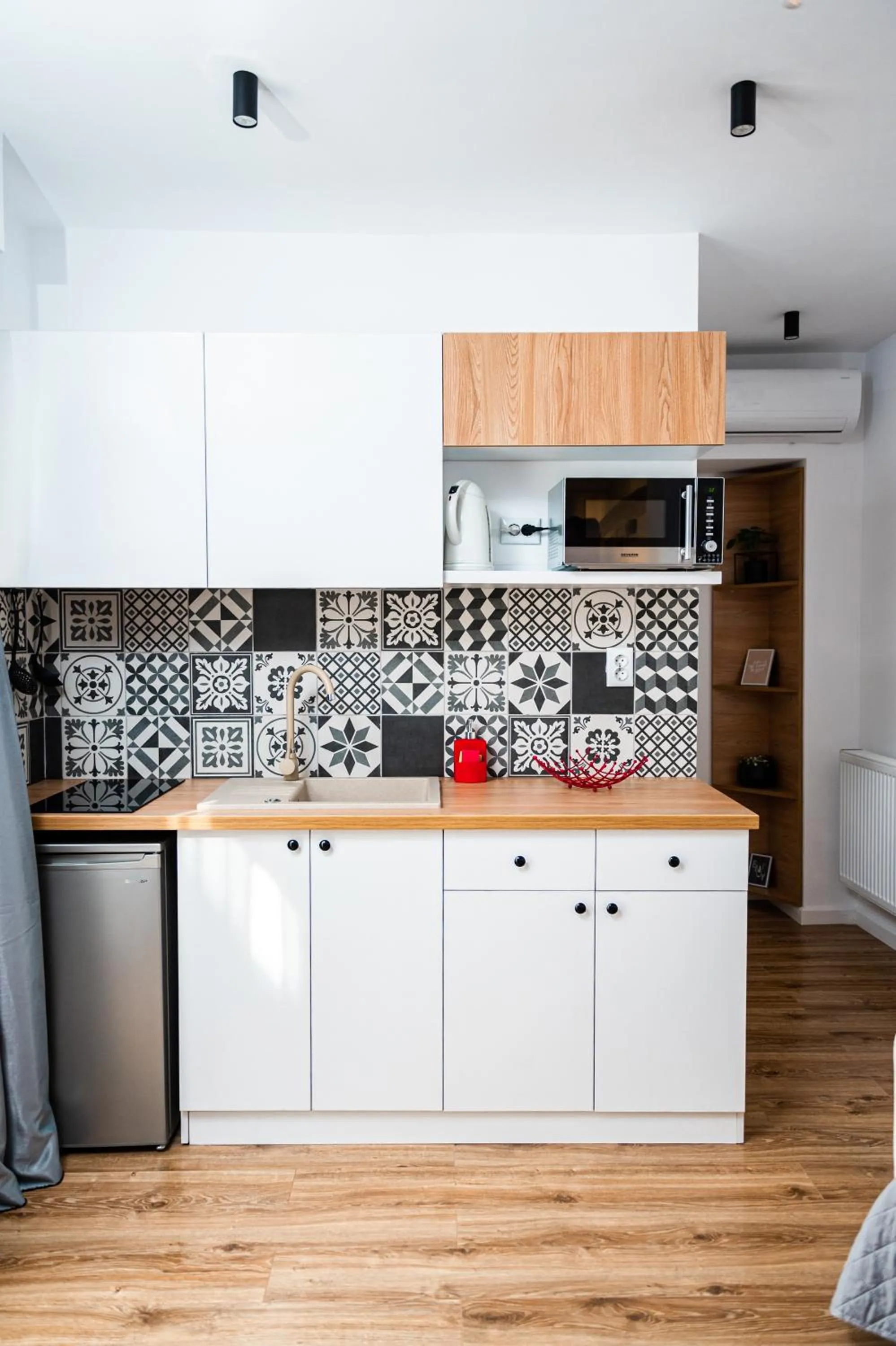 Kitchen or kitchenette in Puzzle Apartaments&Studios