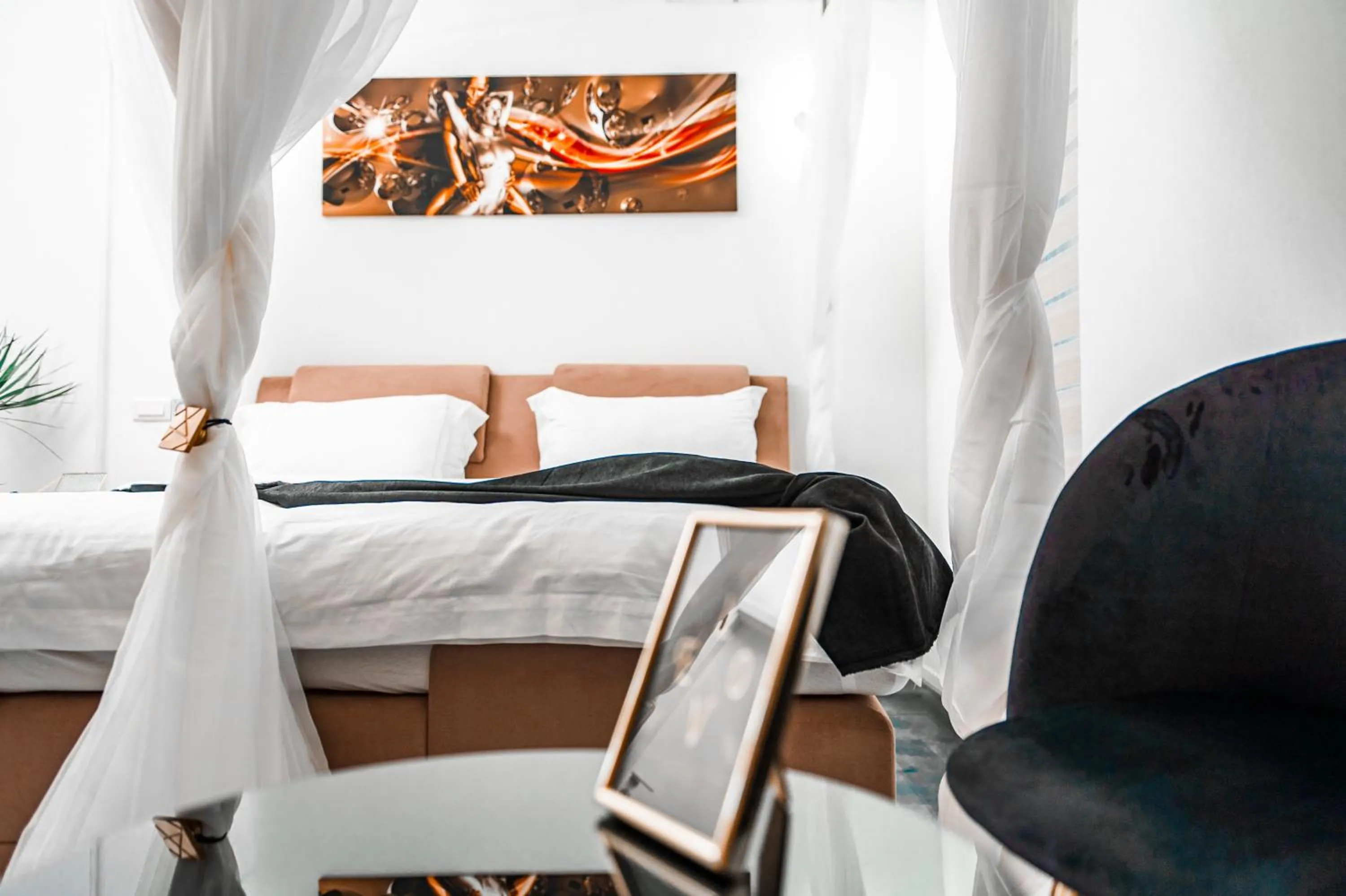 Bed in Puzzle Apartaments&Studios