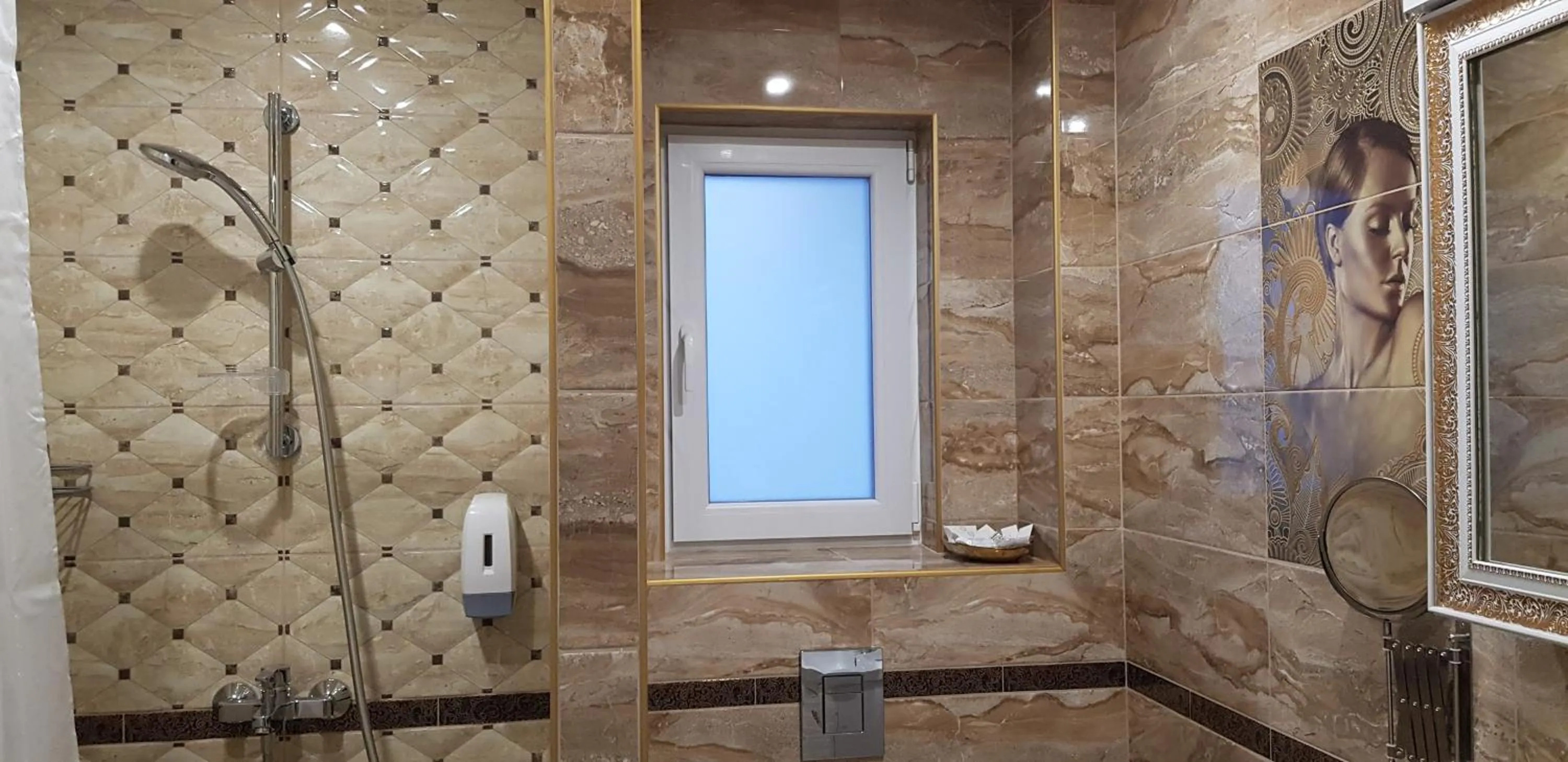 Bathroom in Aparthotel Olympus Plaza - SPA & Indoor Pool