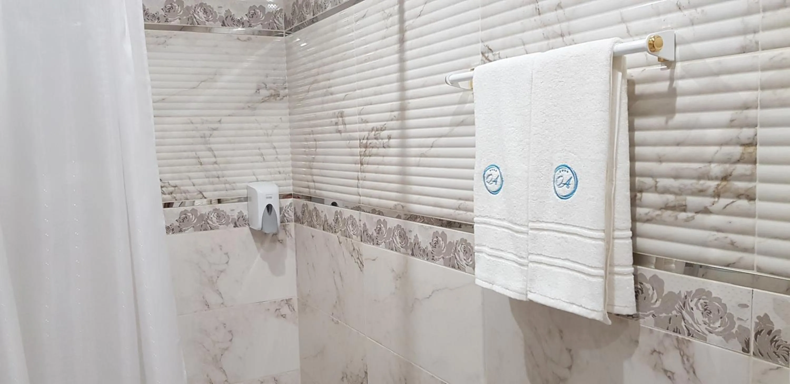 Bathroom in Aparthotel Olympus Plaza - SPA & Indoor Pool