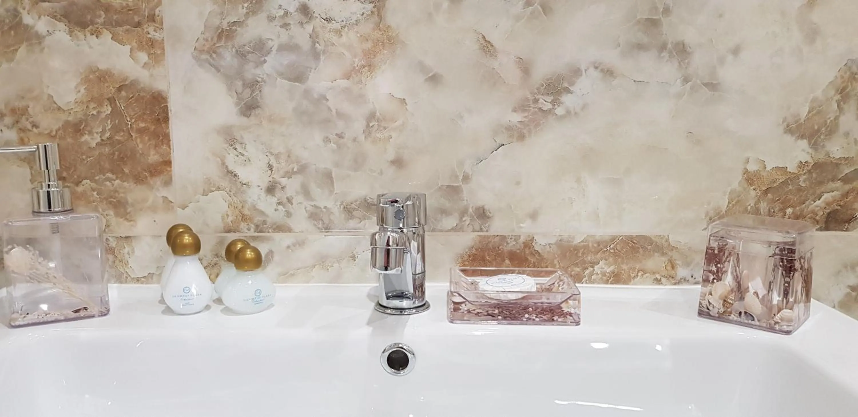 Bathroom in Aparthotel Olympus Plaza - SPA & Indoor Pool