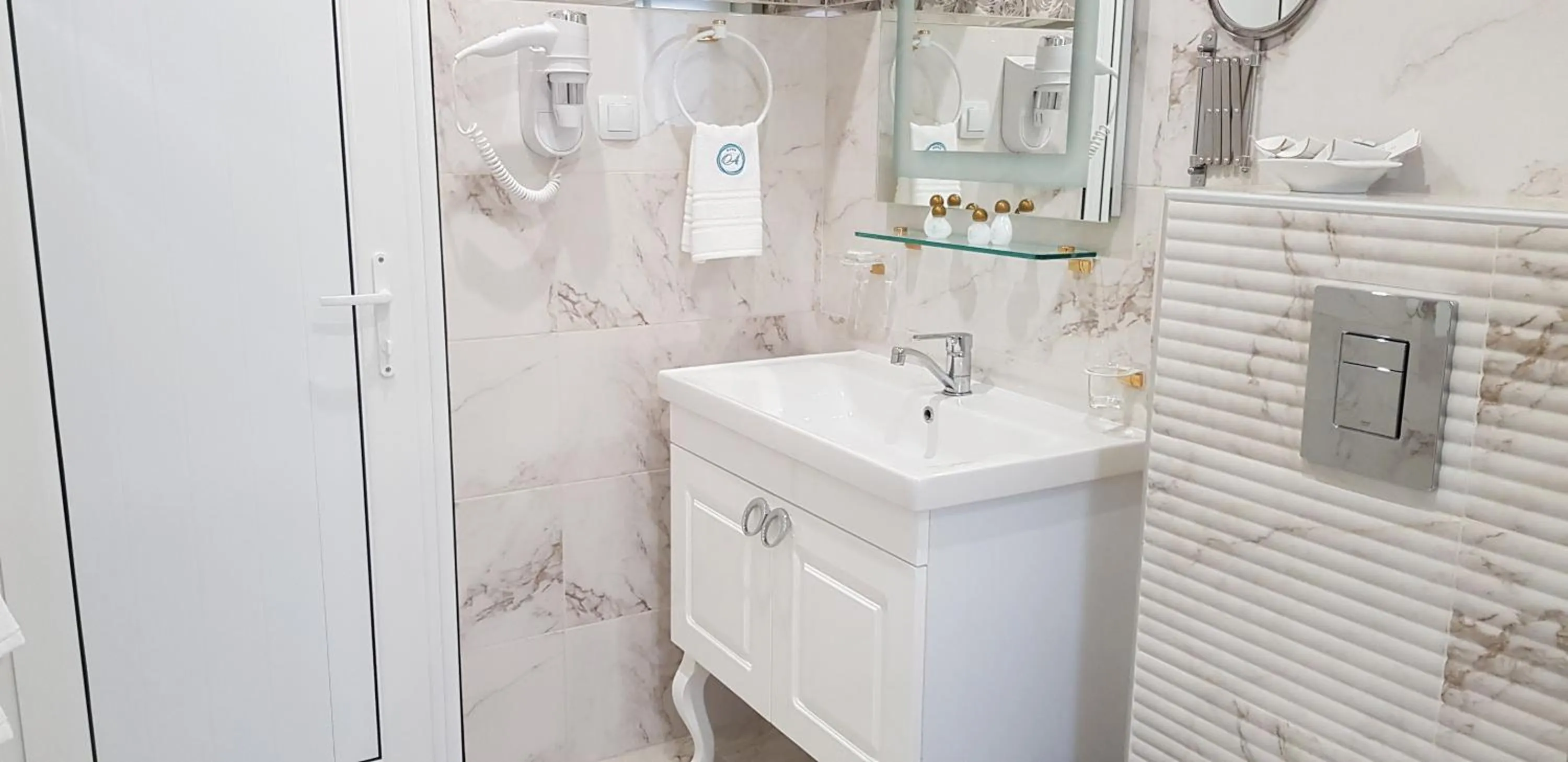 Bathroom in Aparthotel Olympus Plaza - SPA & Indoor Pool