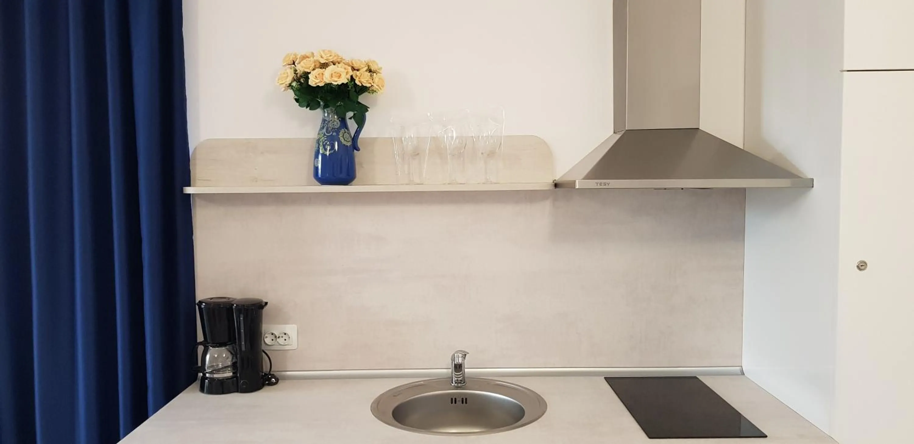 Kitchen or kitchenette in Aparthotel Olympus Plaza - SPA & Indoor Pool