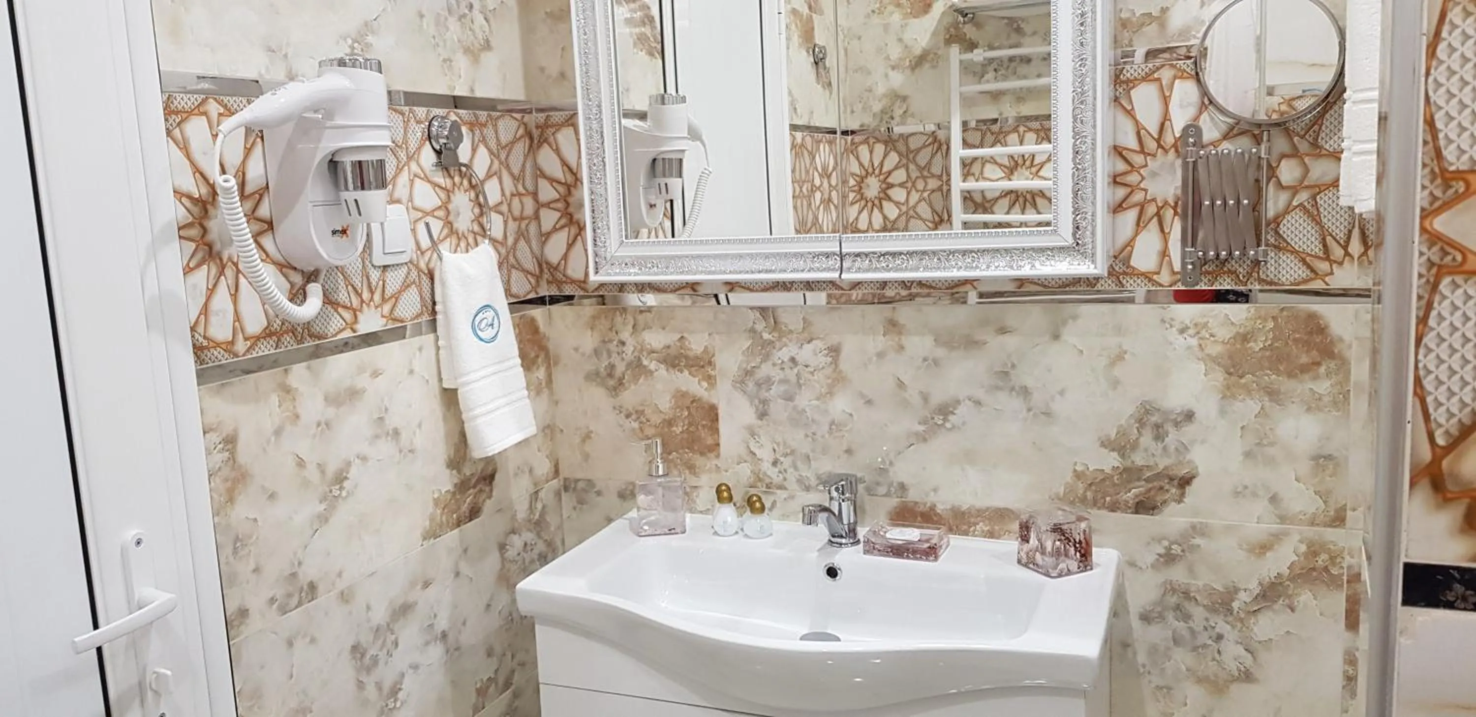 Bathroom in Aparthotel Olympus Plaza - SPA & Indoor Pool