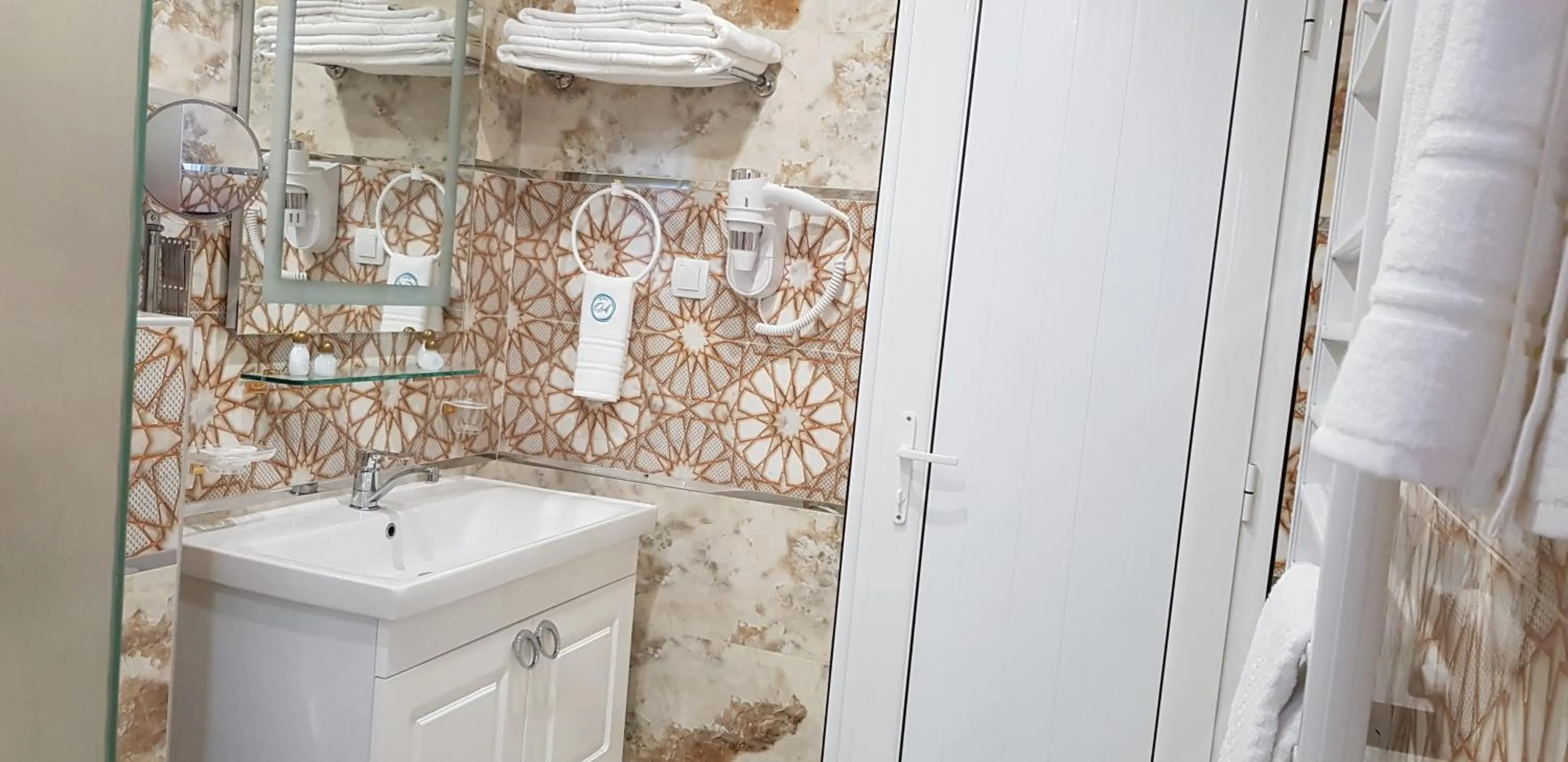 Bathroom in Aparthotel Olympus Plaza - SPA & Indoor Pool