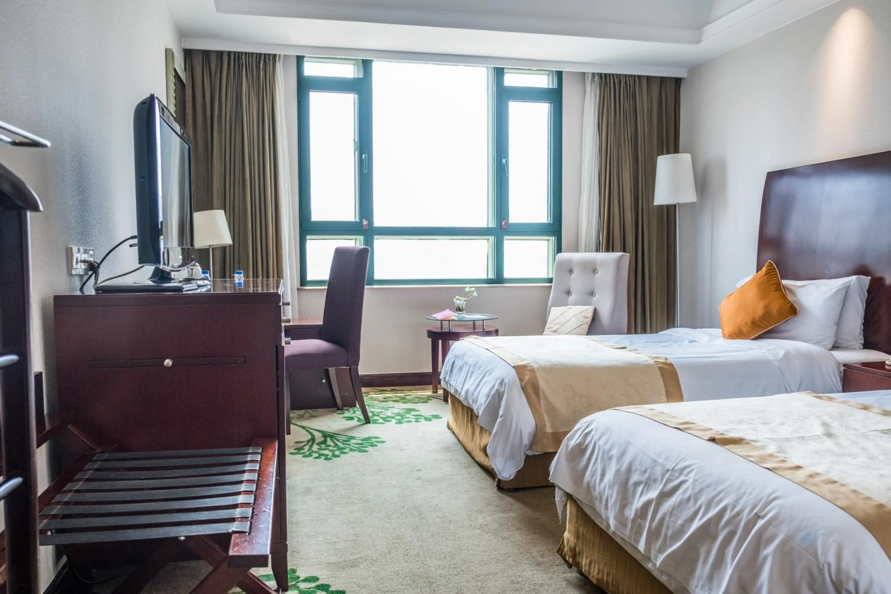 Bed in Merry Hotel Shanghai (Former Rendezvous Merry Hotel Shanghai)