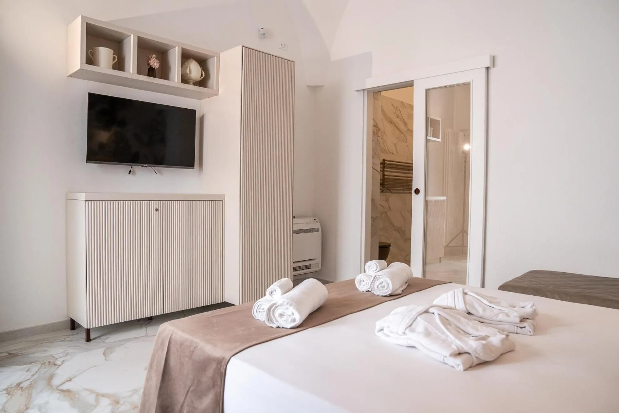 Bed in La Bella Ostuni Suites