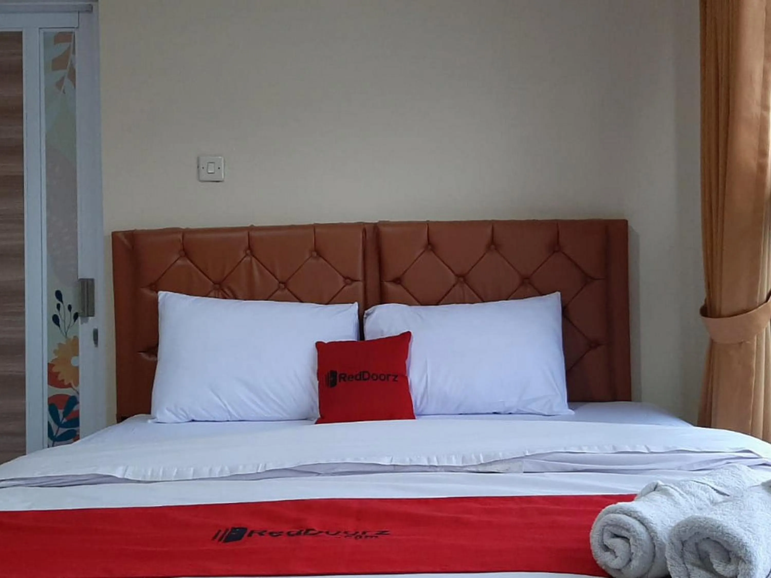Bed in RedDoorz At Hotel Pakem Sari Kaliurang