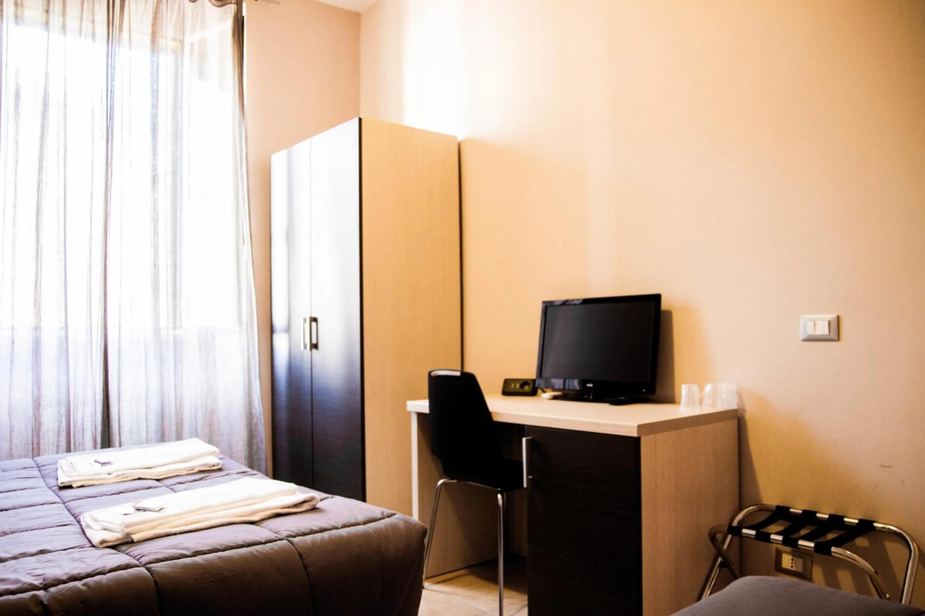 Bedroom, Bed in Mosaic Central Guest House