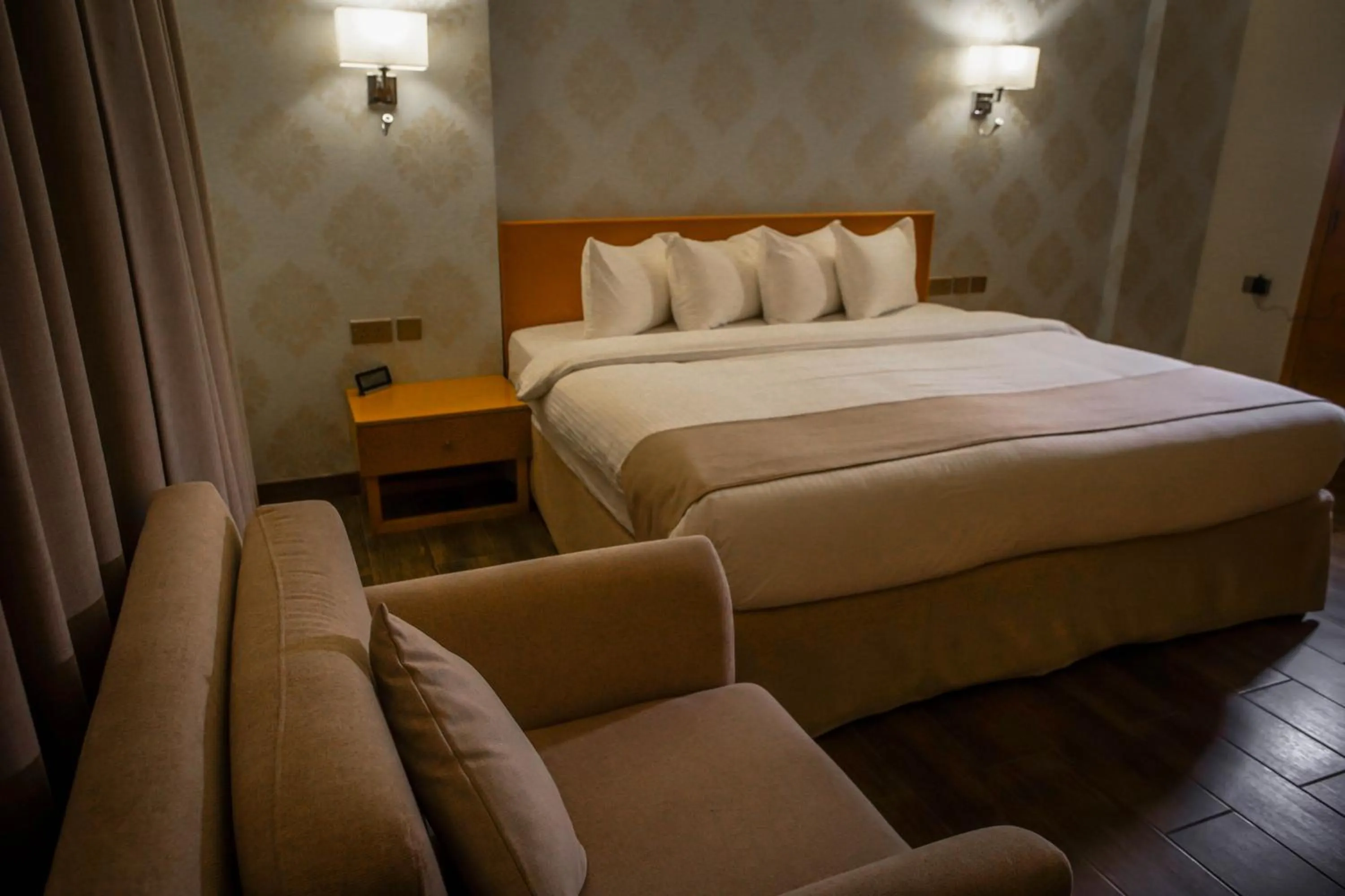 Bed in Sama Muscat Hotel