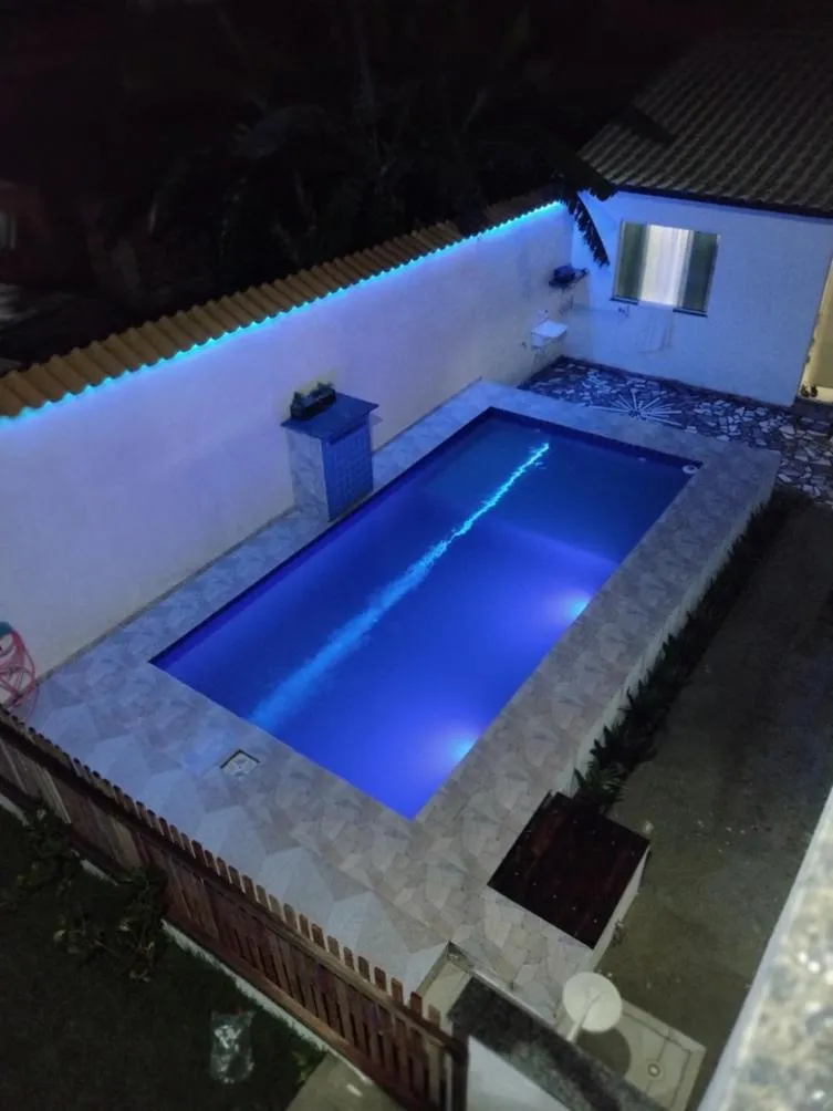 Night in Casa inteira con piscina compartilhada