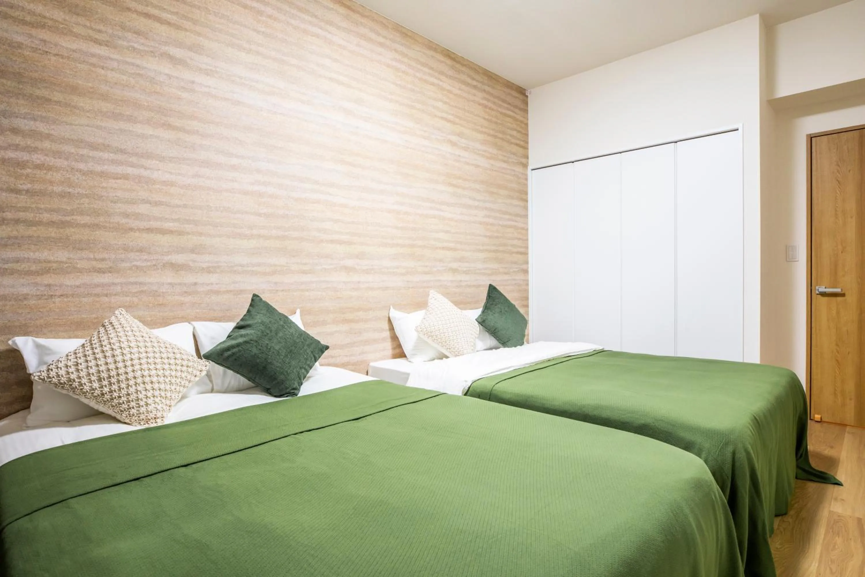 Bed in Rizo Zaizen Hotel