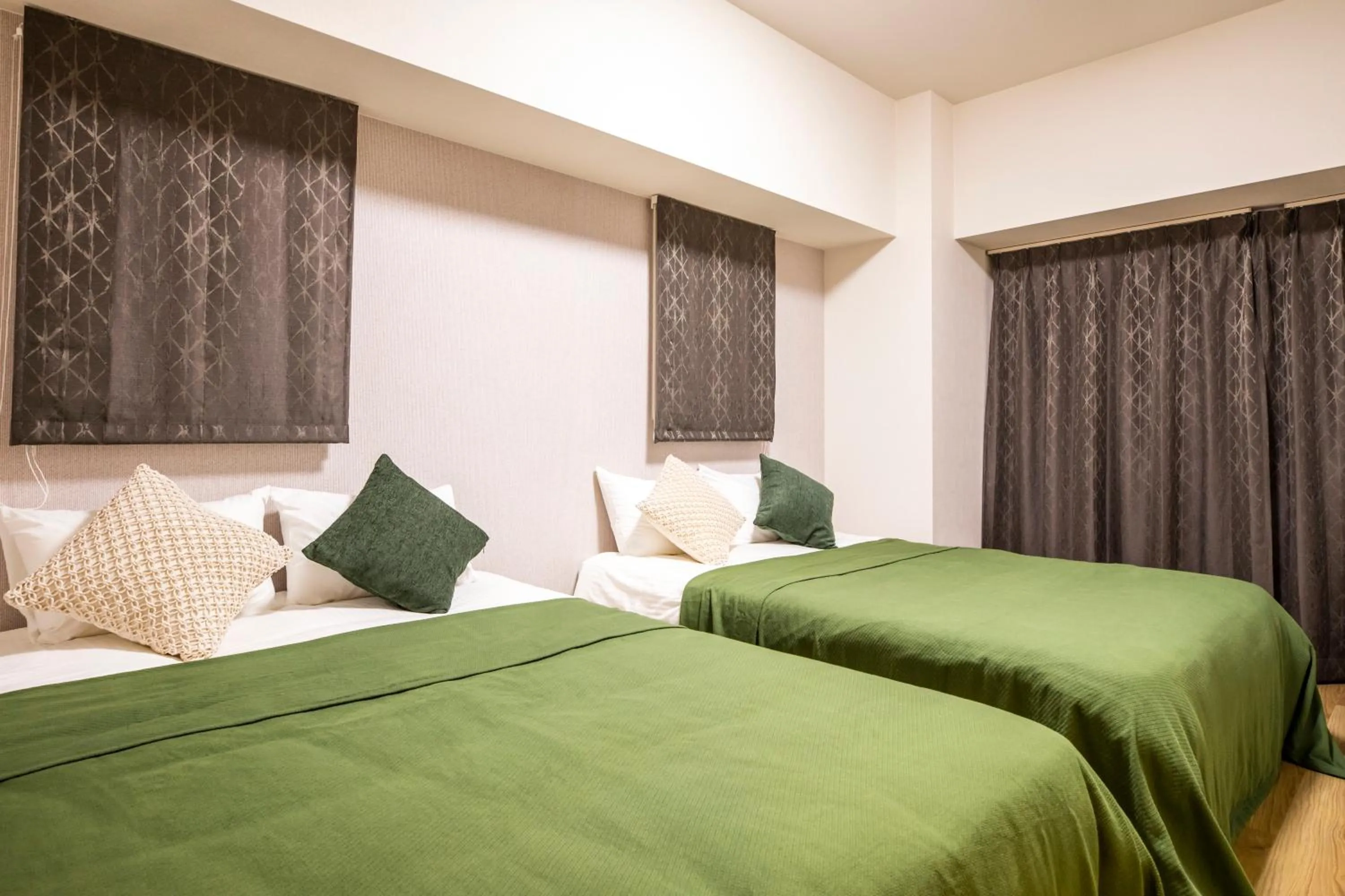 Bed in Rizo Zaizen Hotel