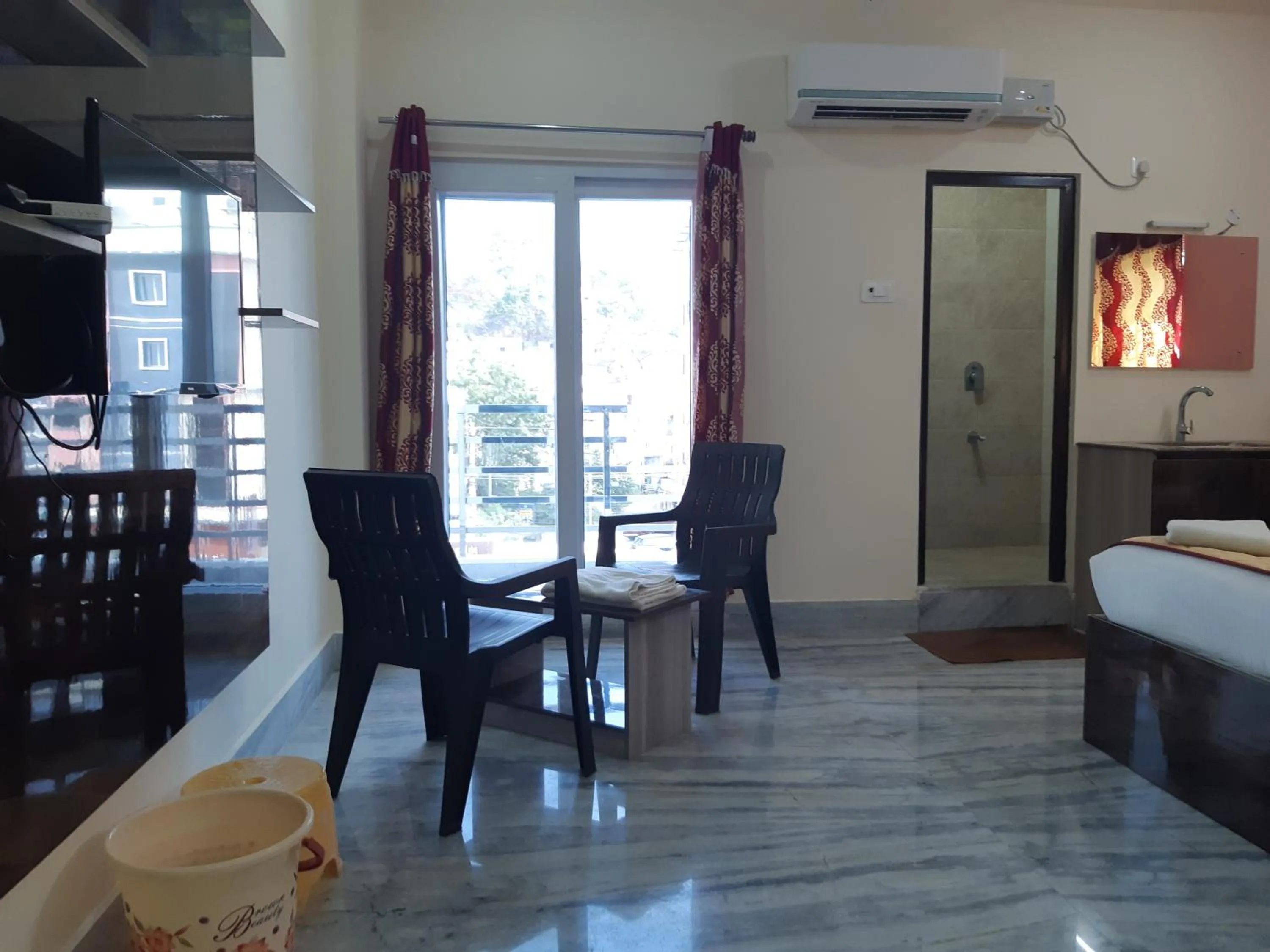 Seating area, Bed in Devansh Bhanu Residency DBR