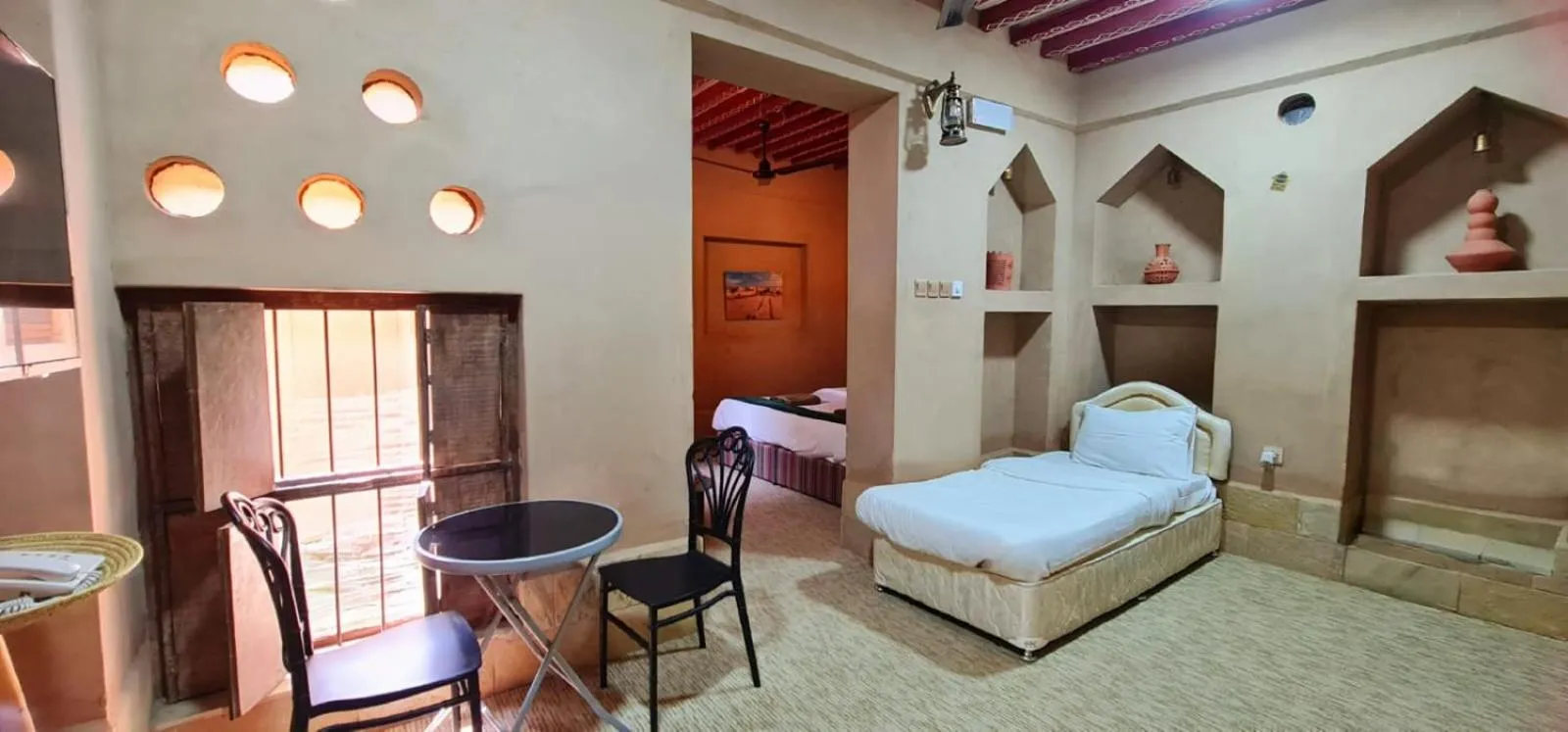 Bed in Bustan inn by Alley Escape
