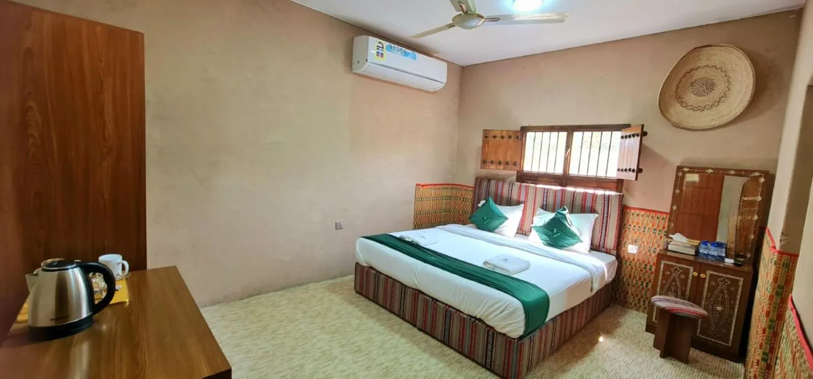 Bed in Bustan inn by Alley Escape