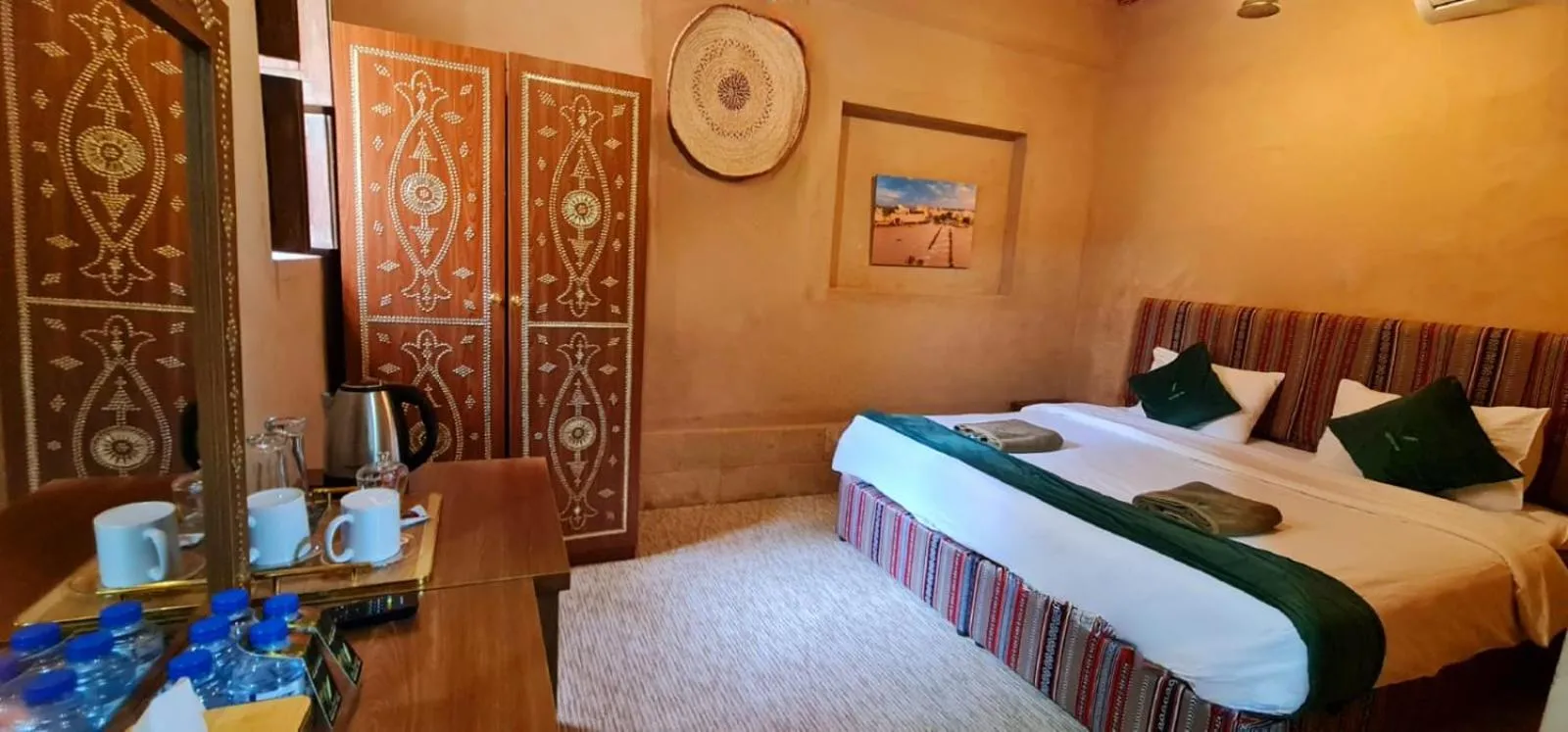 Bed in Bustan inn by Alley Escape