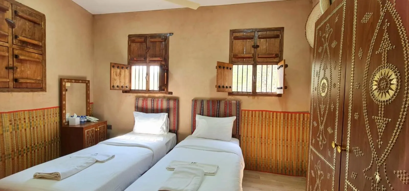 Bed in Bustan inn by Alley Escape