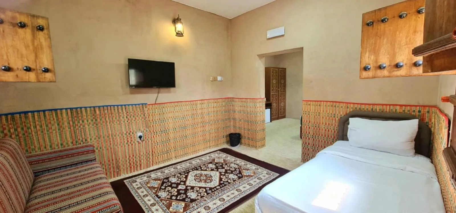 Bed in Bustan inn by Alley Escape