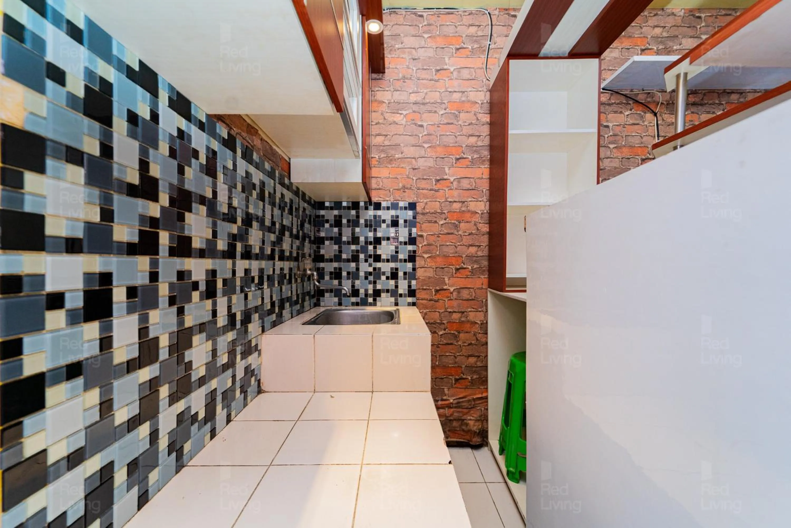 kitchen in Apartemen City Park - Rendy Room Tower H18