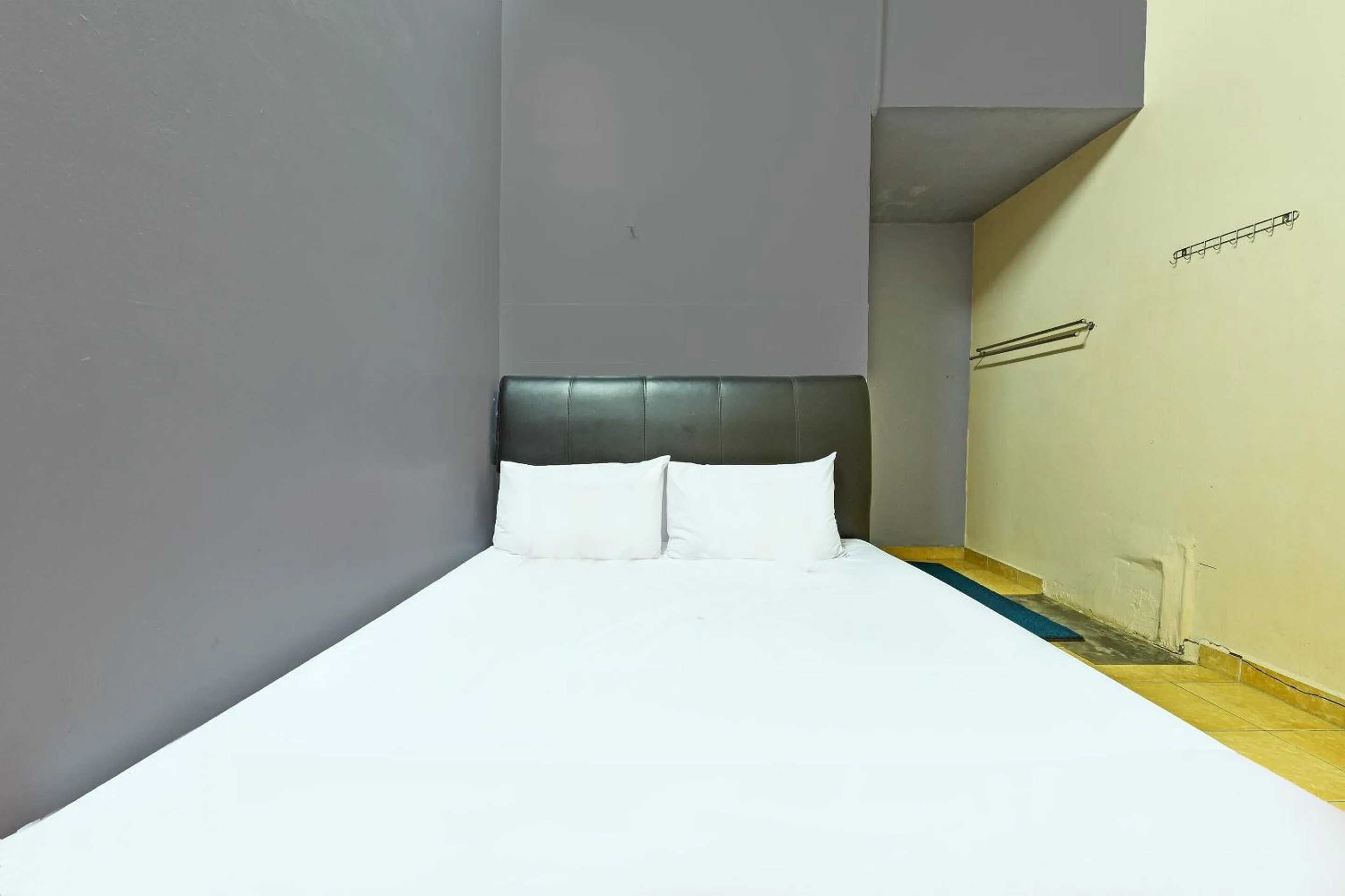 Bedroom in SPOT ON 90144 Corridor Hotel 1