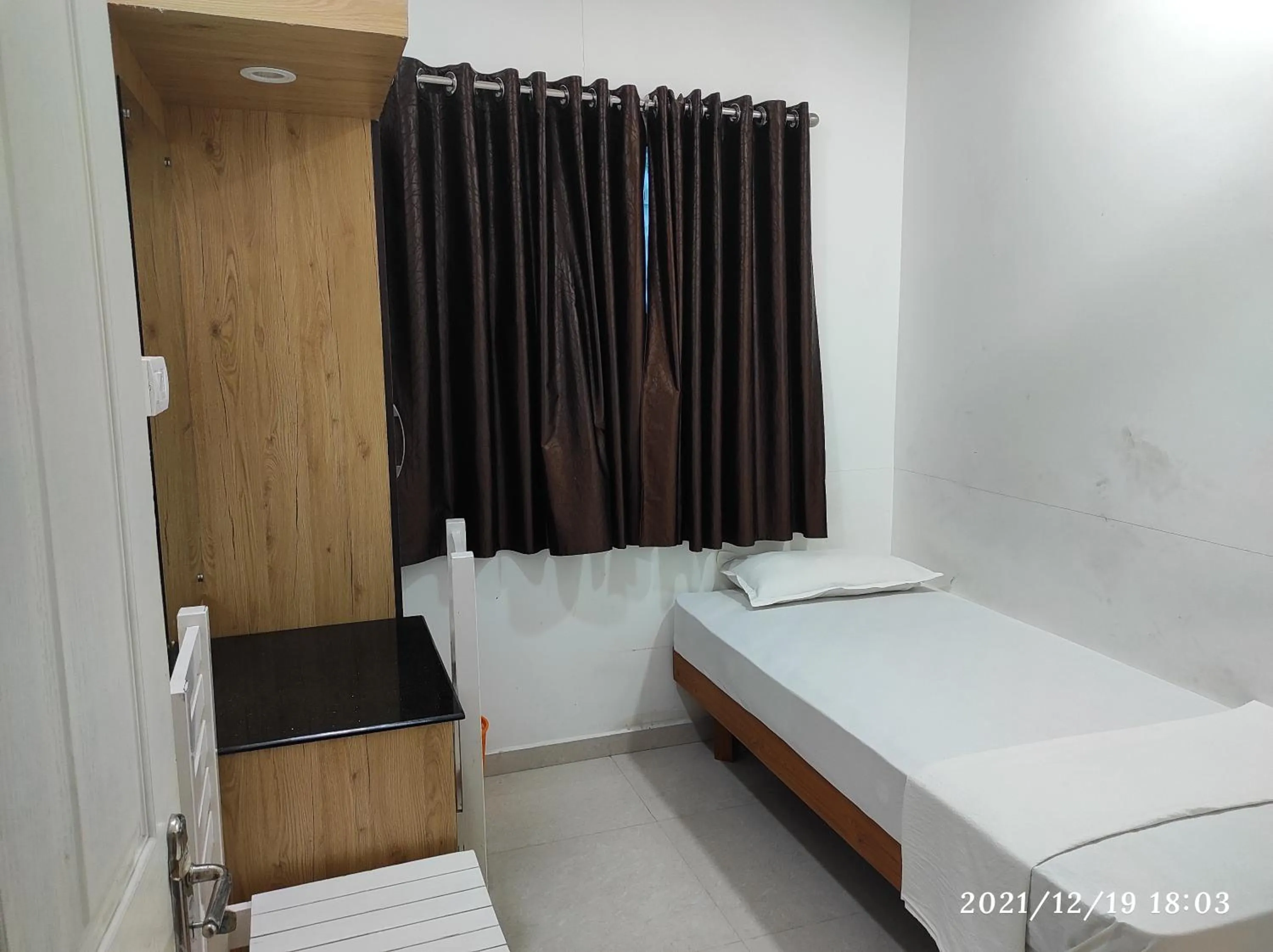 Bed in Quilon Residency