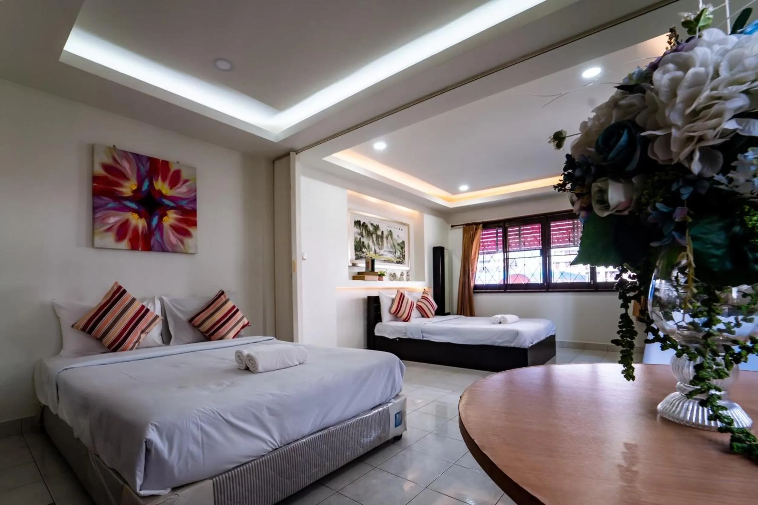 Bedroom in OYO 75377 Check In House