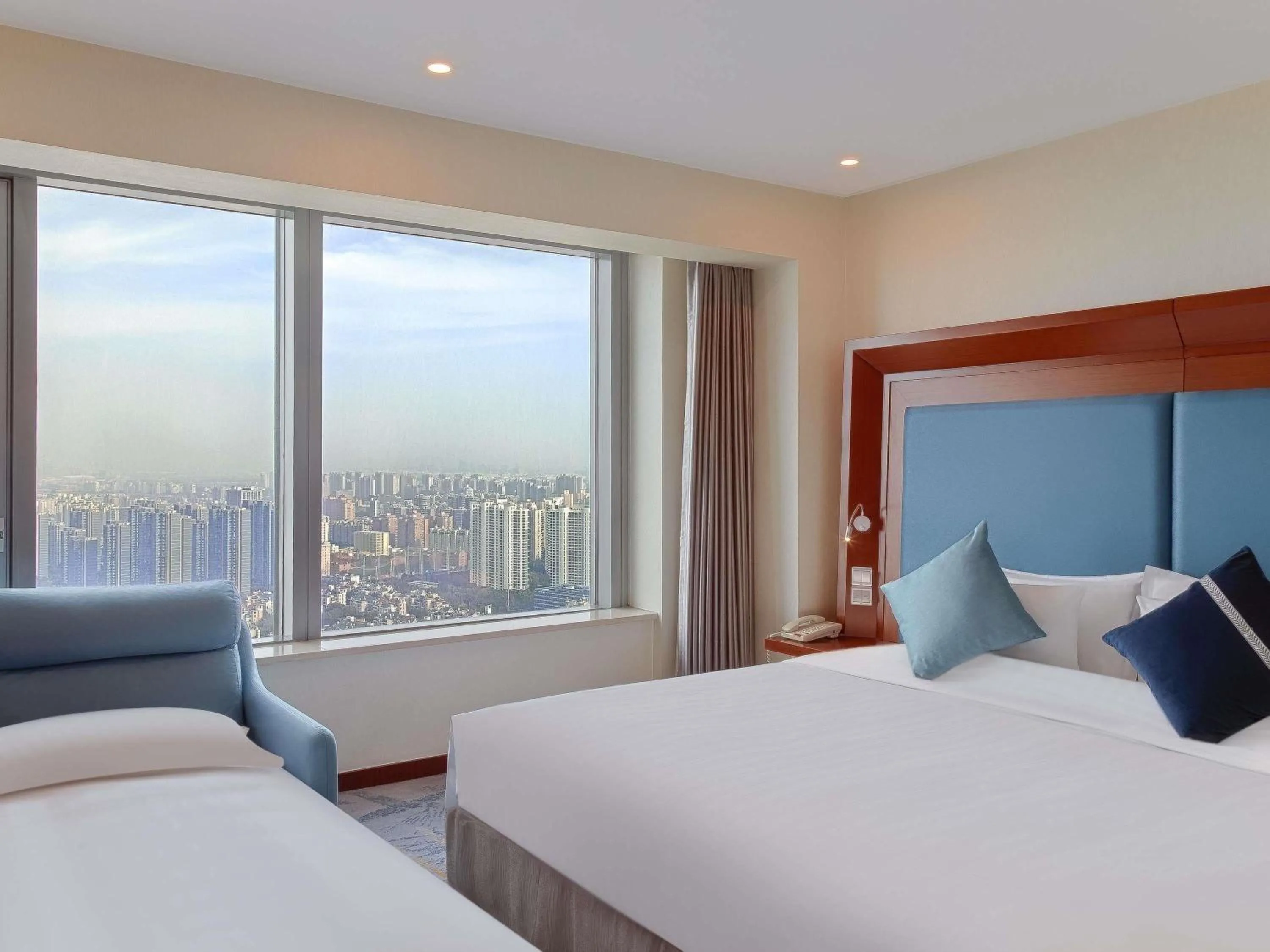 Bedroom, Bed in Novotel Atlantis Shanghai - Enjoy our great-valued breakfast in our rooftop revolving restaurant with a stunning river view & utilize our FREE self-serviced laundry