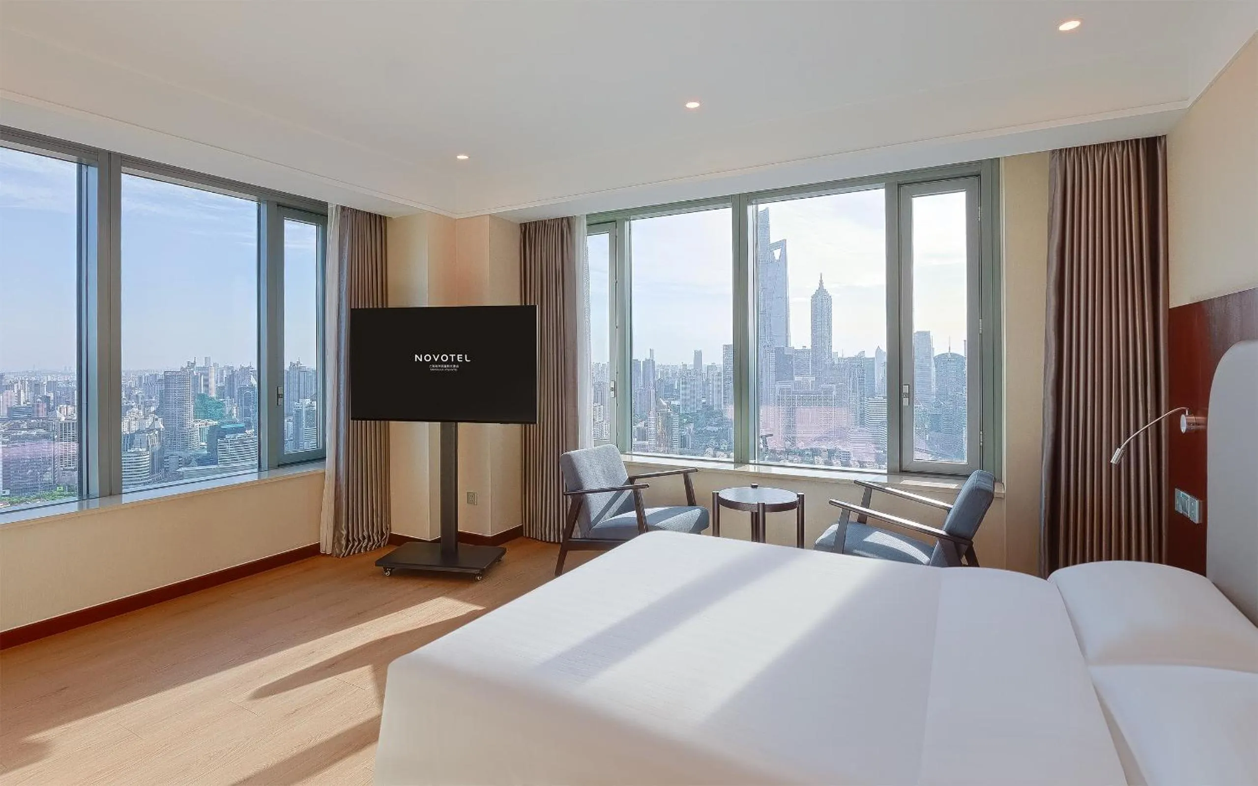 Bed in Novotel Atlantis Shanghai - Enjoy our great-valued breakfast in our rooftop revolving restaurant with a stunning river view & utilize our FREE self-serviced laundry