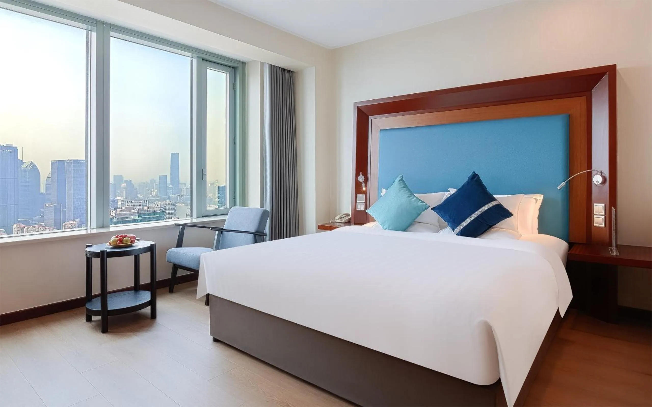 Bed in Novotel Atlantis Shanghai - Enjoy our great-valued breakfast in our rooftop revolving restaurant with a stunning river view & utilize our FREE self-serviced laundry