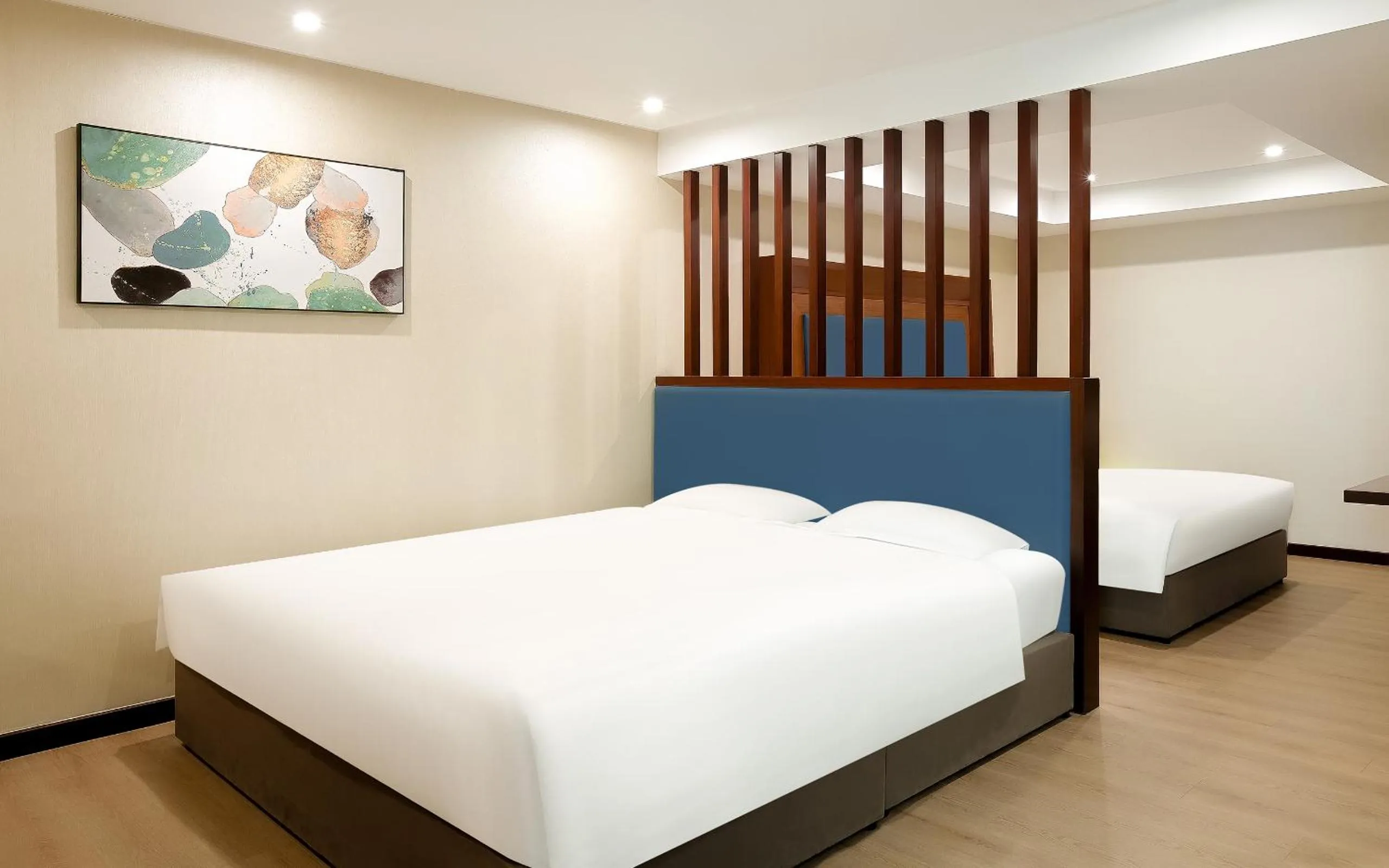 Bed in Novotel Atlantis Shanghai - Enjoy our great-valued breakfast in our rooftop revolving restaurant with a stunning river view & utilize our FREE self-serviced laundry