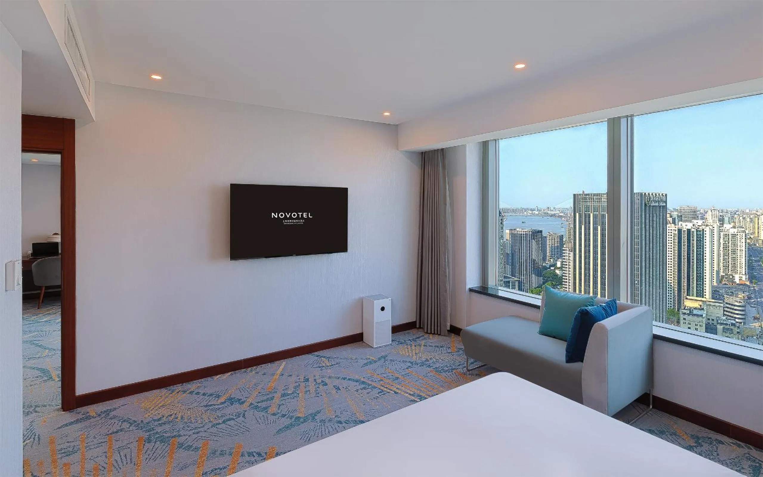 Bed in Novotel Atlantis Shanghai - Enjoy our great-valued breakfast in our rooftop revolving restaurant with a stunning river view & utilize our FREE self-serviced laundry