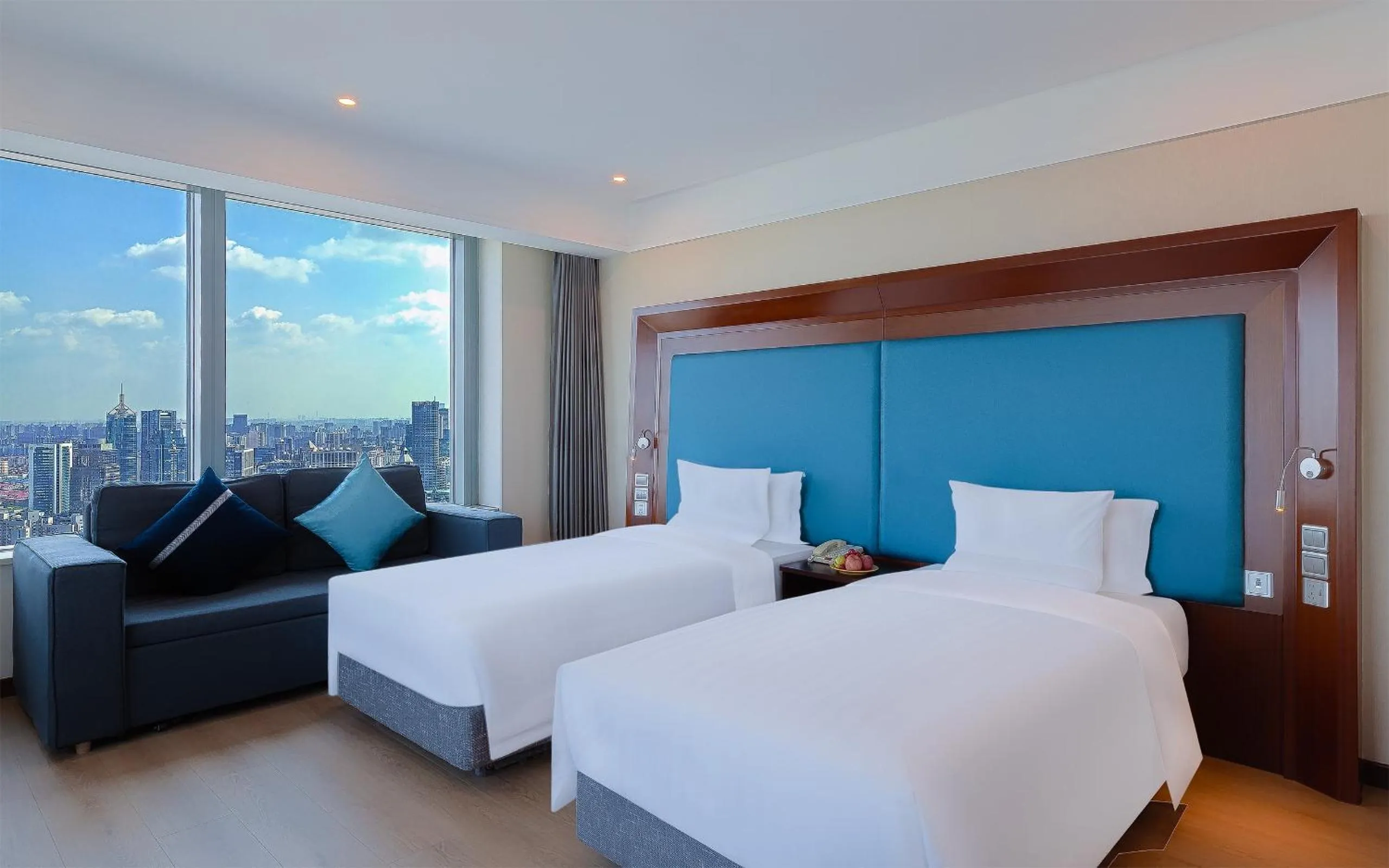 Bed in Novotel Atlantis Shanghai - Enjoy our great-valued breakfast in our rooftop revolving restaurant with a stunning river view & utilize our FREE self-serviced laundry