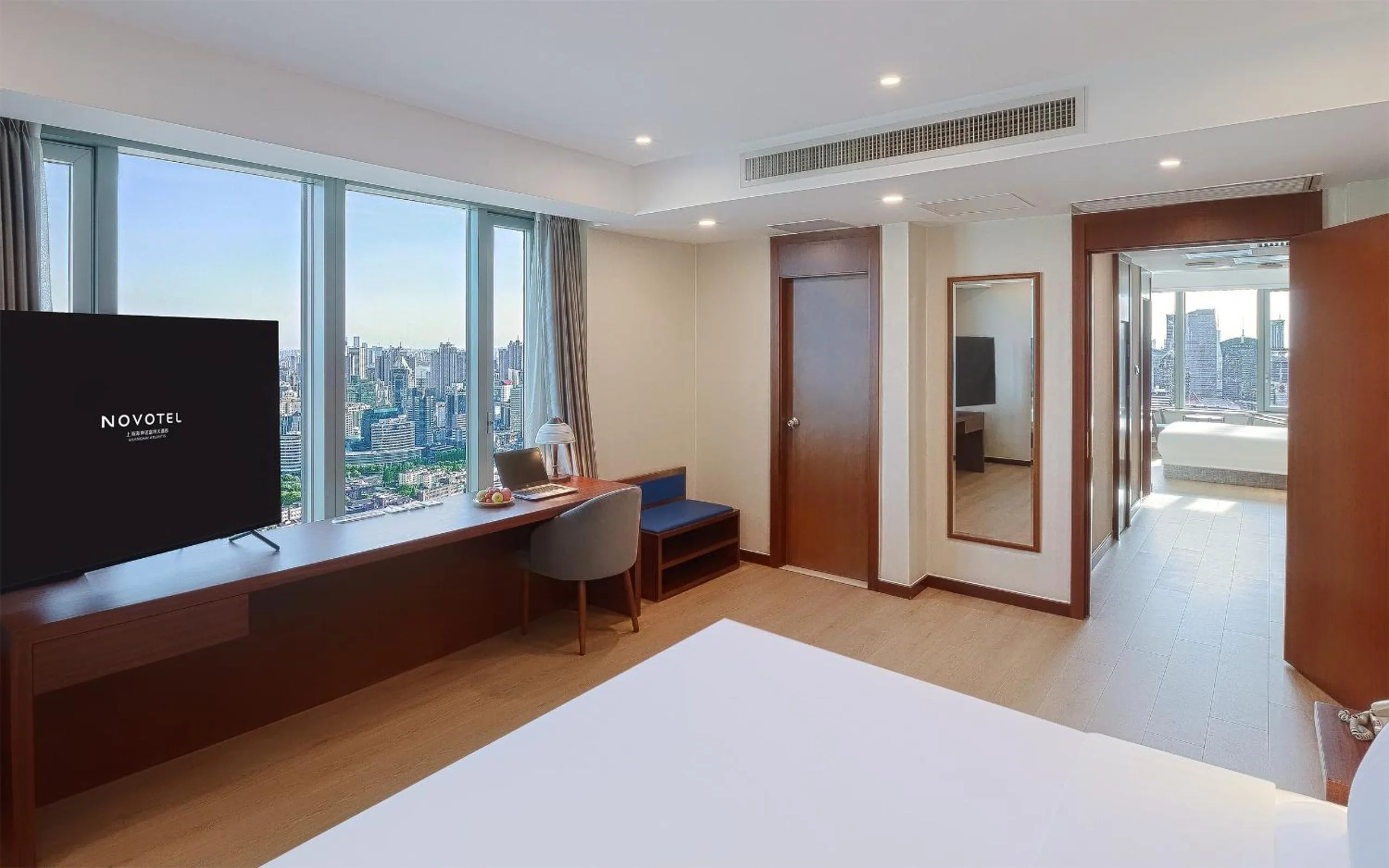 Bed in Novotel Atlantis Shanghai - Enjoy our great-valued breakfast in our rooftop revolving restaurant with a stunning river view & utilize our FREE self-serviced laundry
