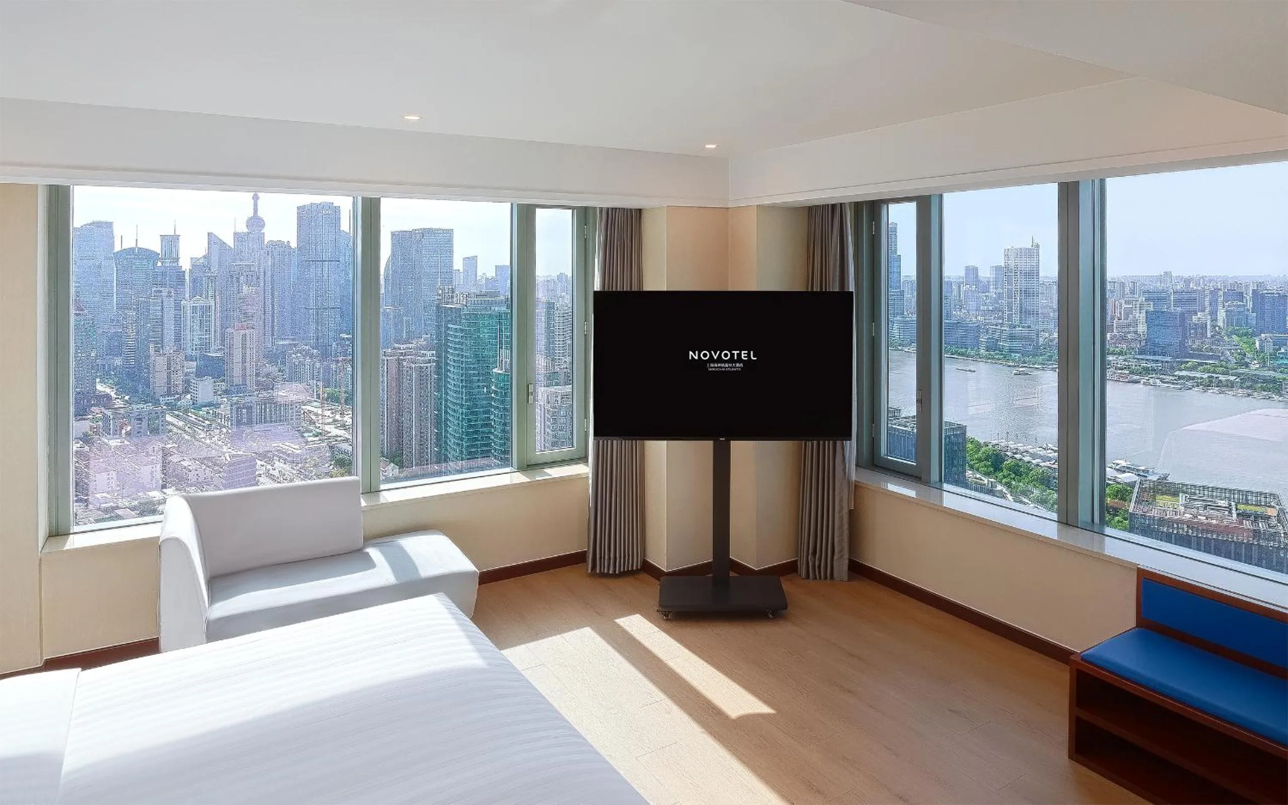 Bed in Novotel Atlantis Shanghai - Enjoy our great-valued breakfast in our rooftop revolving restaurant with a stunning river view & utilize our FREE self-serviced laundry