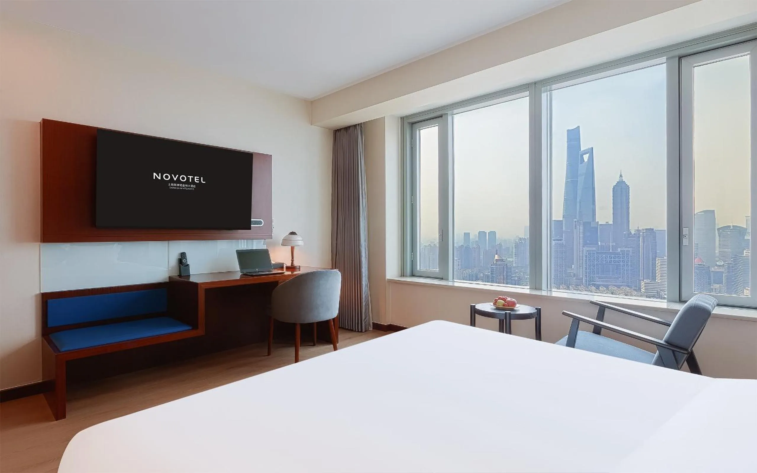 Bed in Novotel Atlantis Shanghai - Enjoy our great-valued breakfast in our rooftop revolving restaurant with a stunning river view & utilize our FREE self-serviced laundry