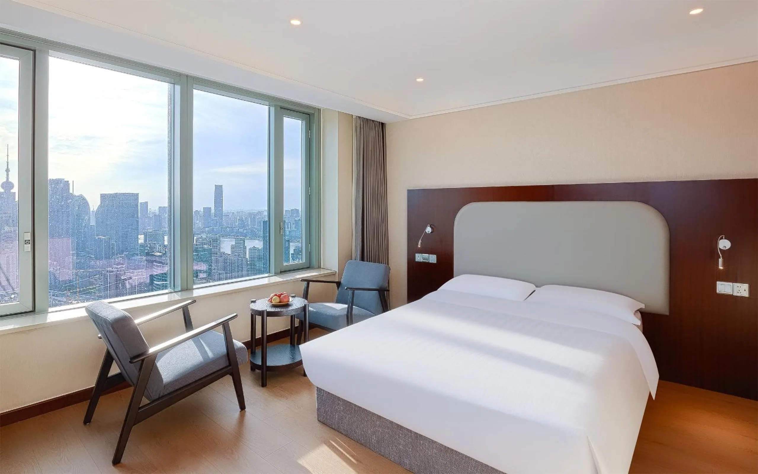 Bed in Novotel Atlantis Shanghai - Enjoy our great-valued breakfast in our rooftop revolving restaurant with a stunning river view & utilize our FREE self-serviced laundry