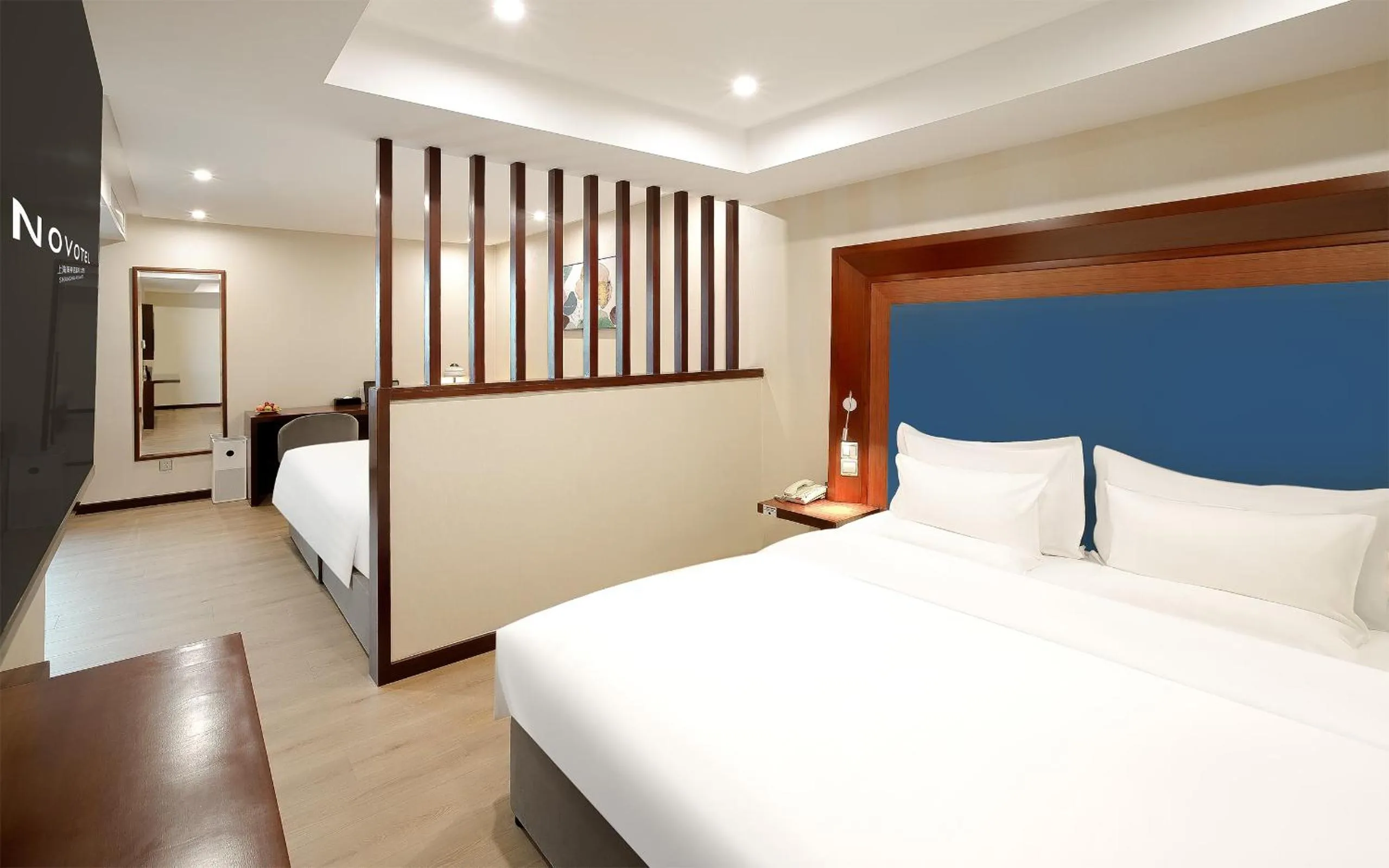 Bed in Novotel Atlantis Shanghai - Enjoy our great-valued breakfast in our rooftop revolving restaurant with a stunning river view & utilize our FREE self-serviced laundry