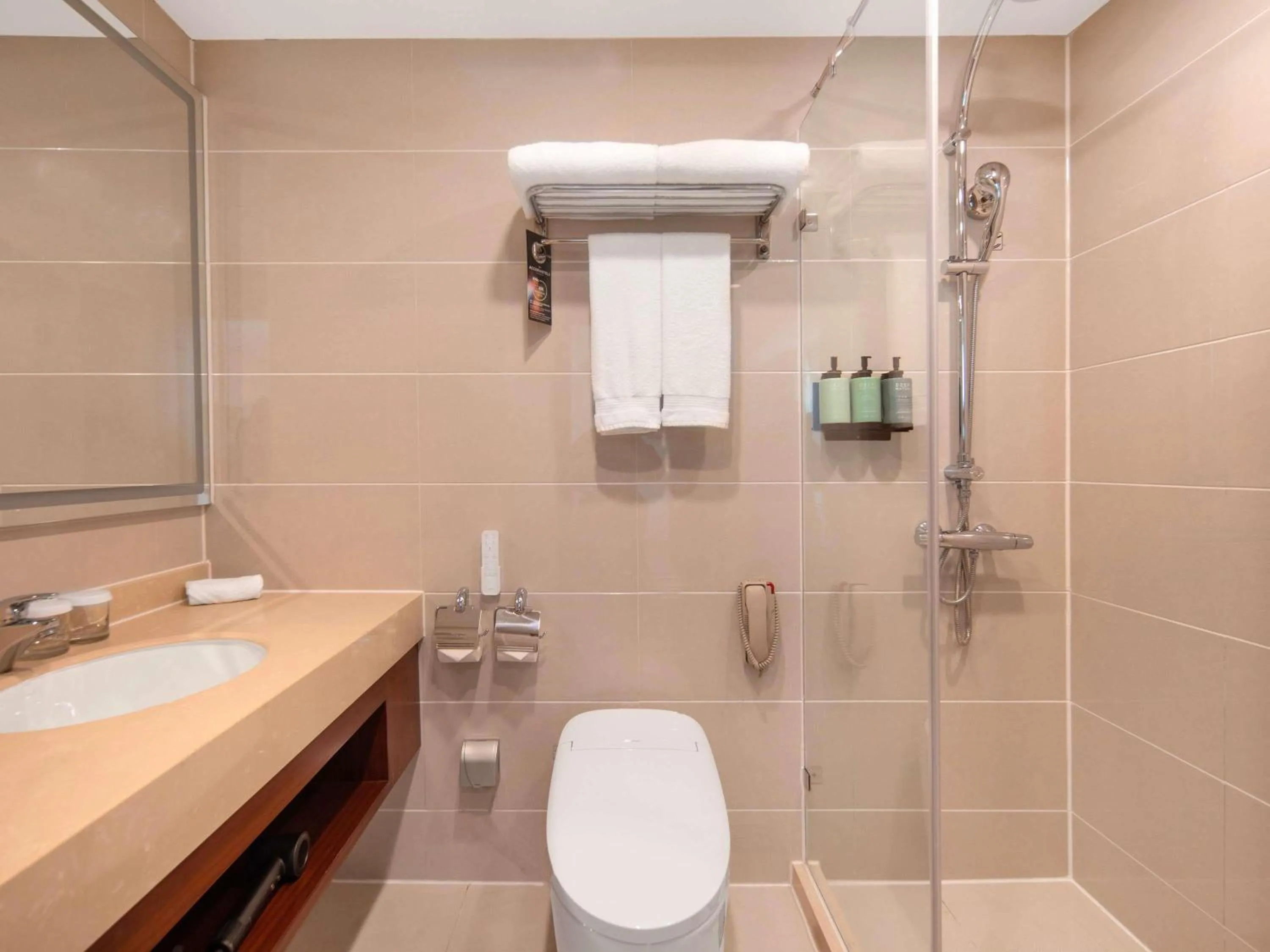 Bedroom in Novotel Atlantis Shanghai - Enjoy our great-valued breakfast in our rooftop revolving restaurant with a stunning river view & utilize our FREE self-serviced laundry