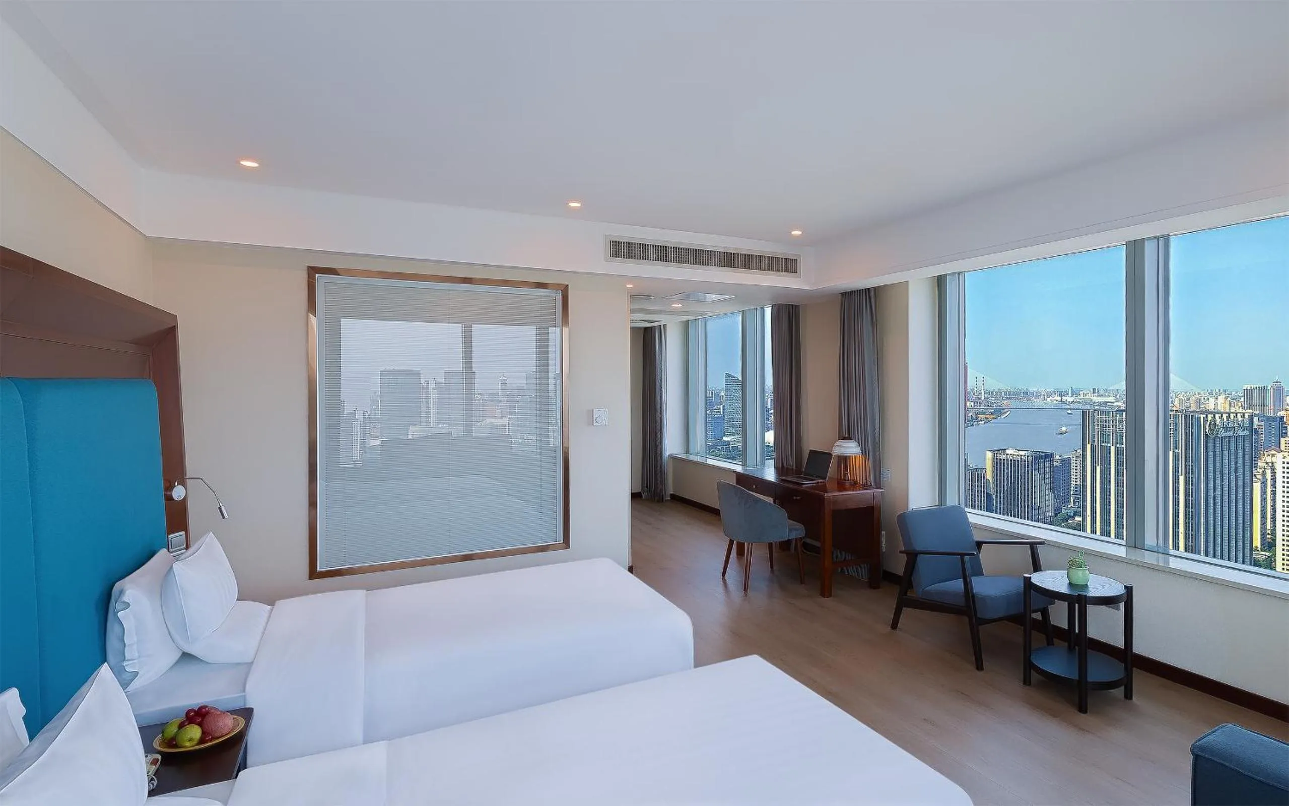 Bed in Novotel Atlantis Shanghai - Enjoy our great-valued breakfast in our rooftop revolving restaurant with a stunning river view & utilize our FREE self-serviced laundry